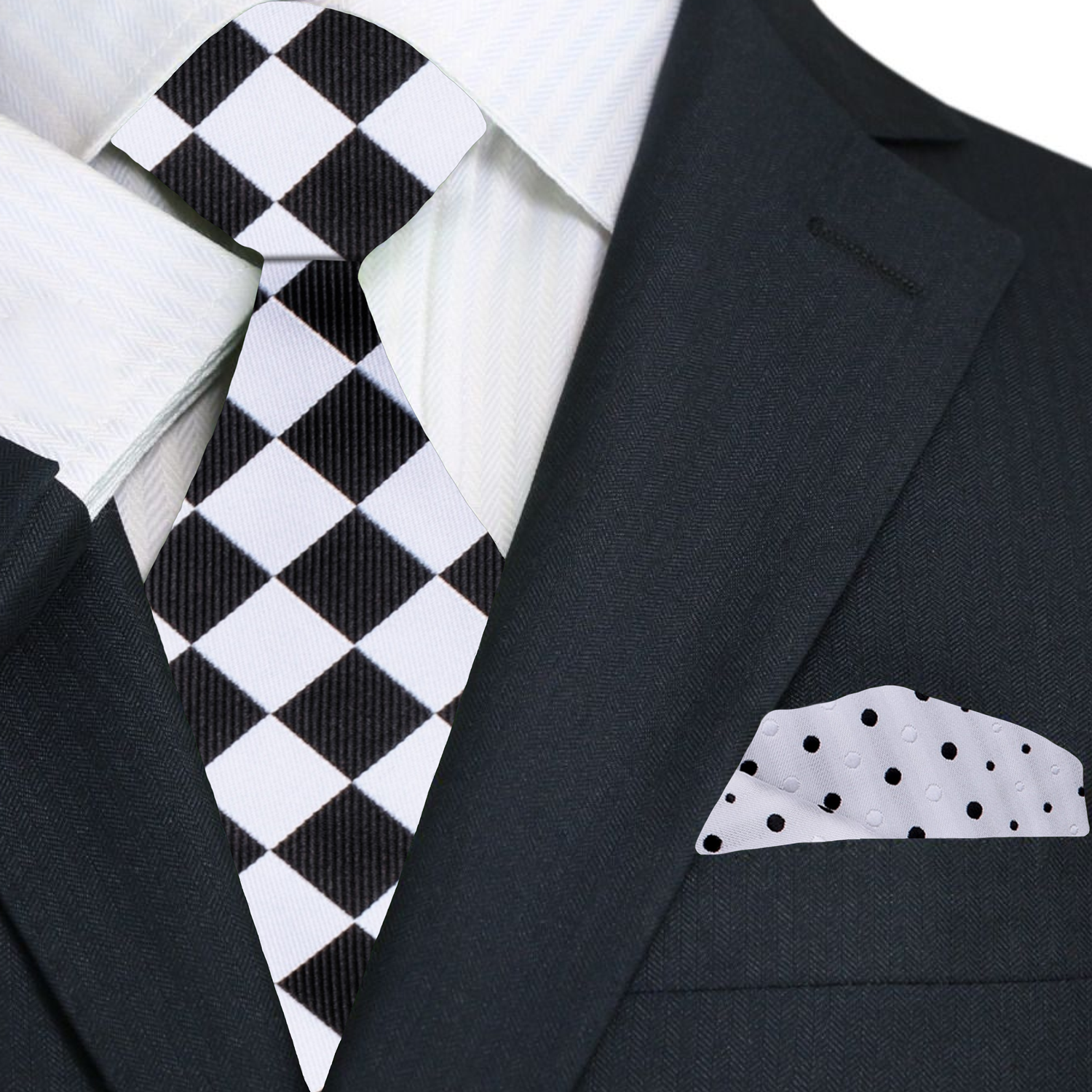 Full view of the elegant necktie paired with a white dress shirt and charcoal suit.