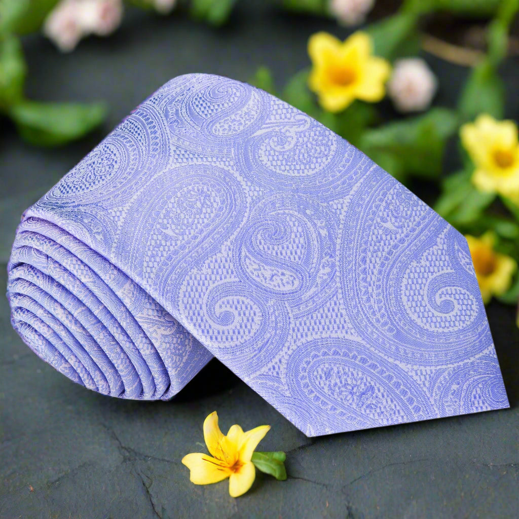 Elegant grey paisley silk necktie displayed on a mannequin, perfect for weddings and formal events.