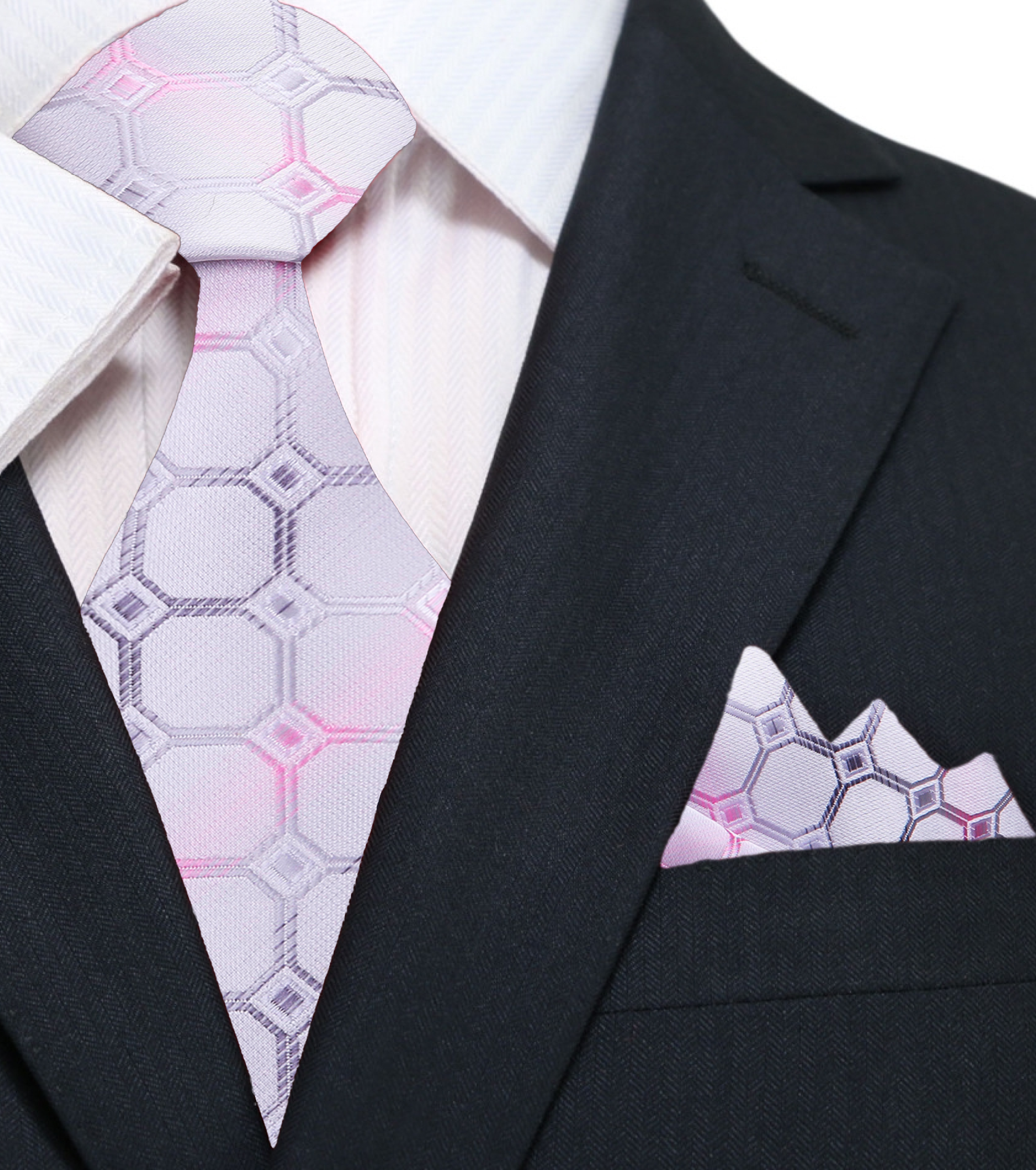 Silver and pink geometric silk tie paired with a light grey suit for a sophisticated look.