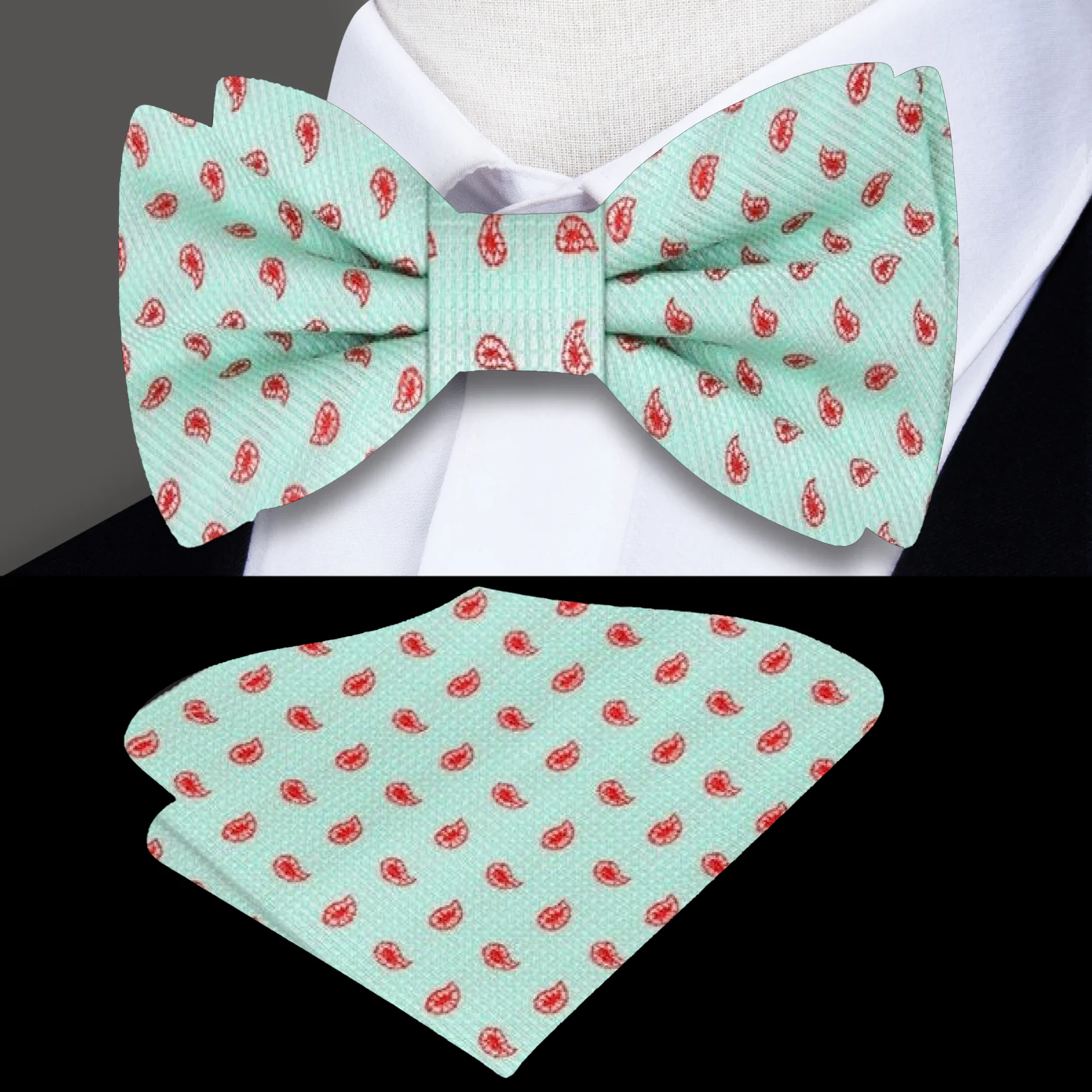 Close-up of mint green silk bow tie with red paisley pattern for weddings