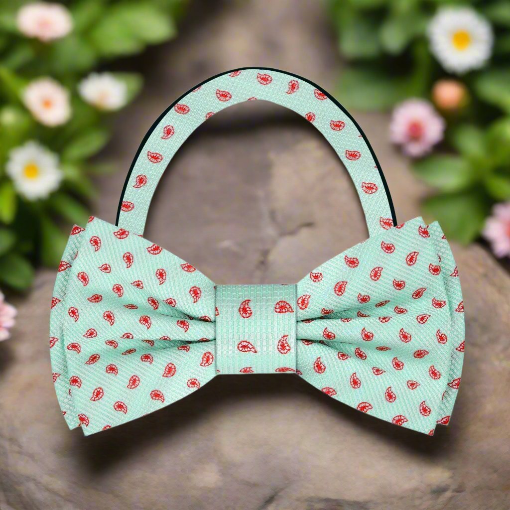 Folded silk bow tie lying on a white dress shirt for style inspiration
