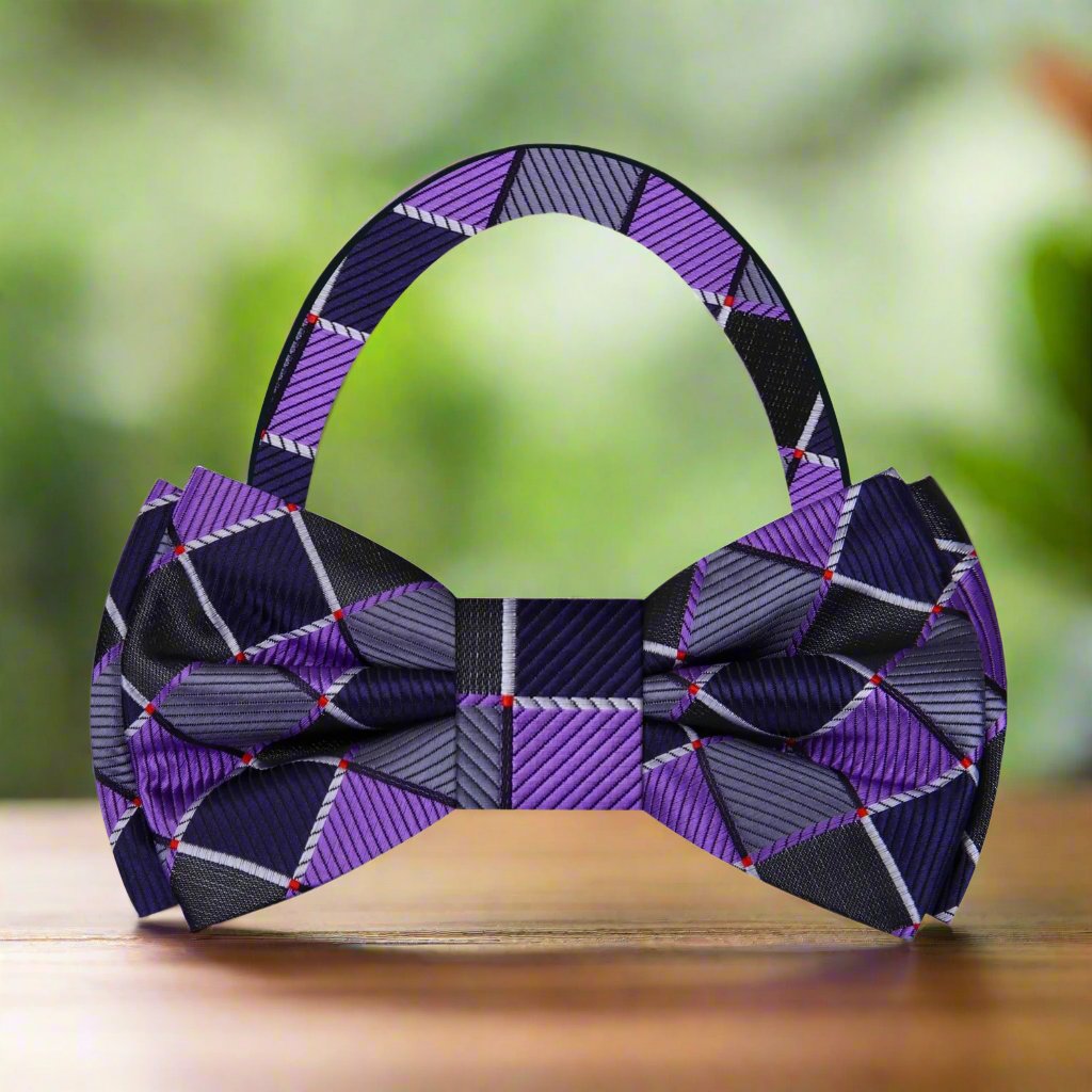 Close-up of a premium geometric bow tie showcasing intricate pattern and silk fabric