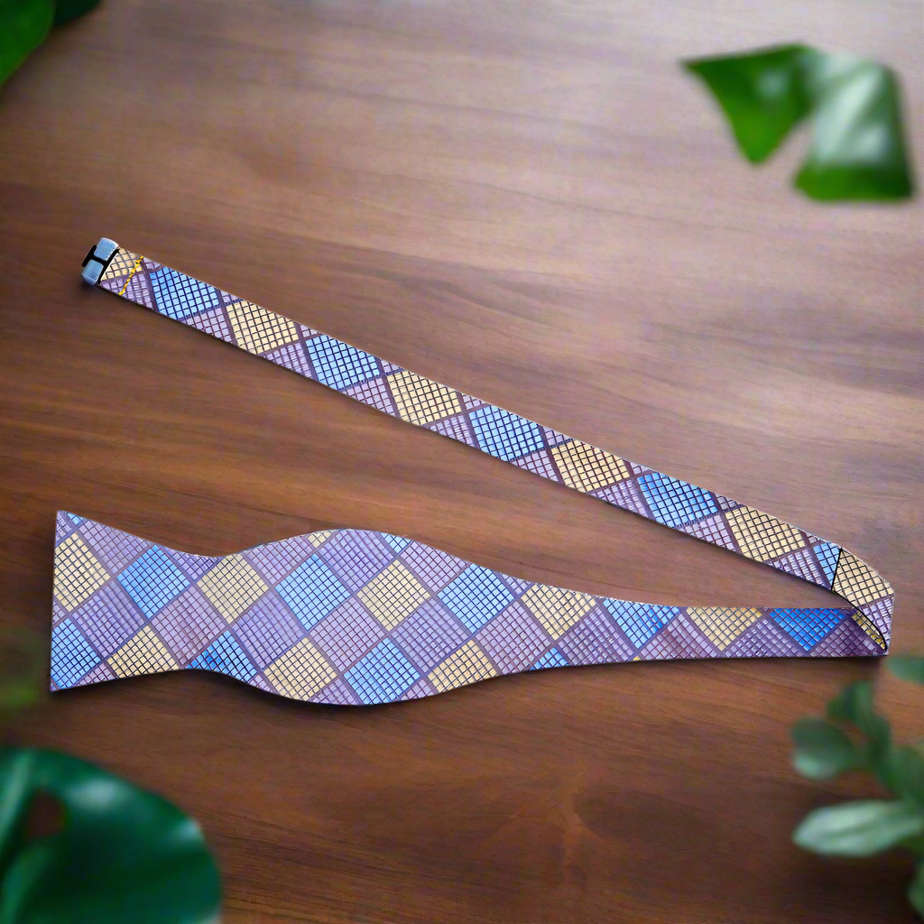 Front view of a geometric silk bow tie in pastel colors, suitable for weddings