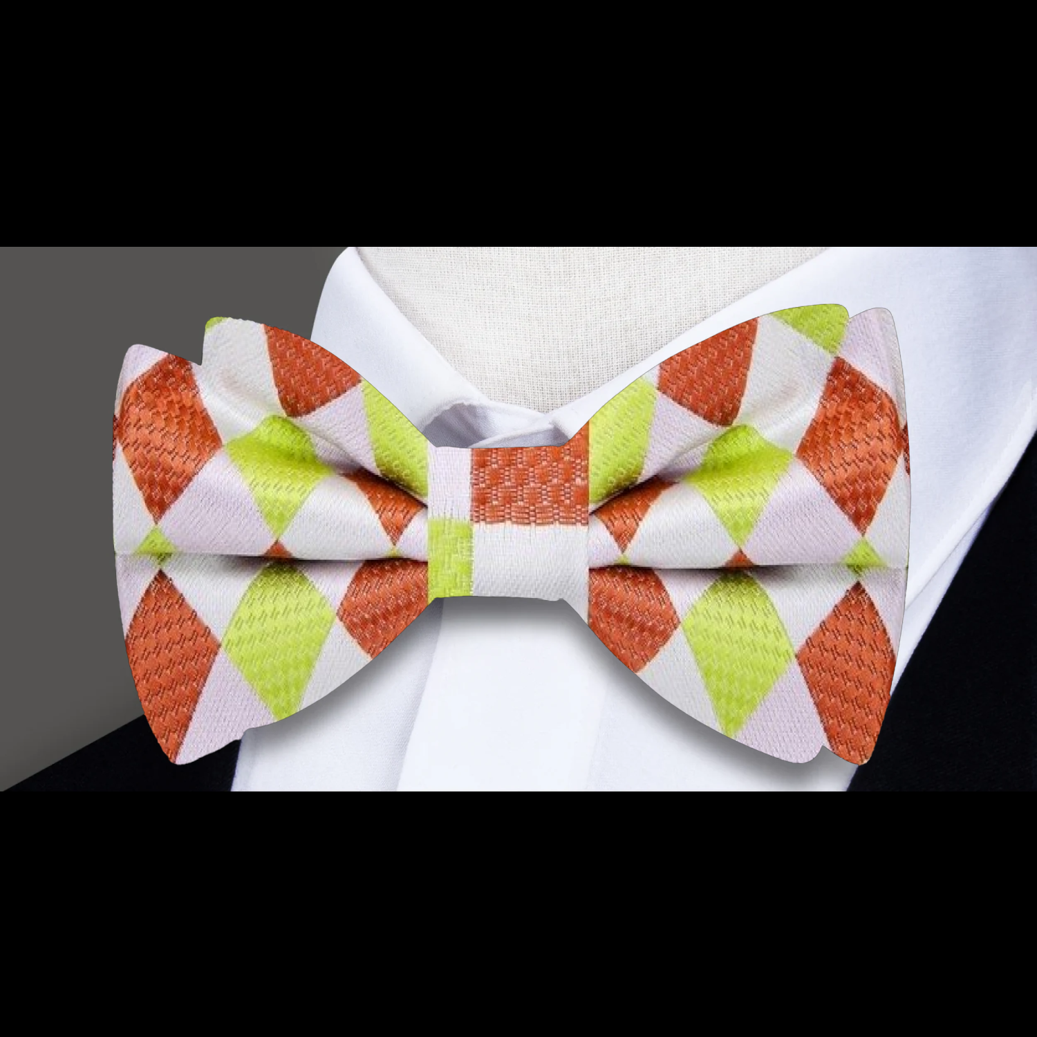 Yellow and blue plaid silk bow tie elegantly displayed on a white background.