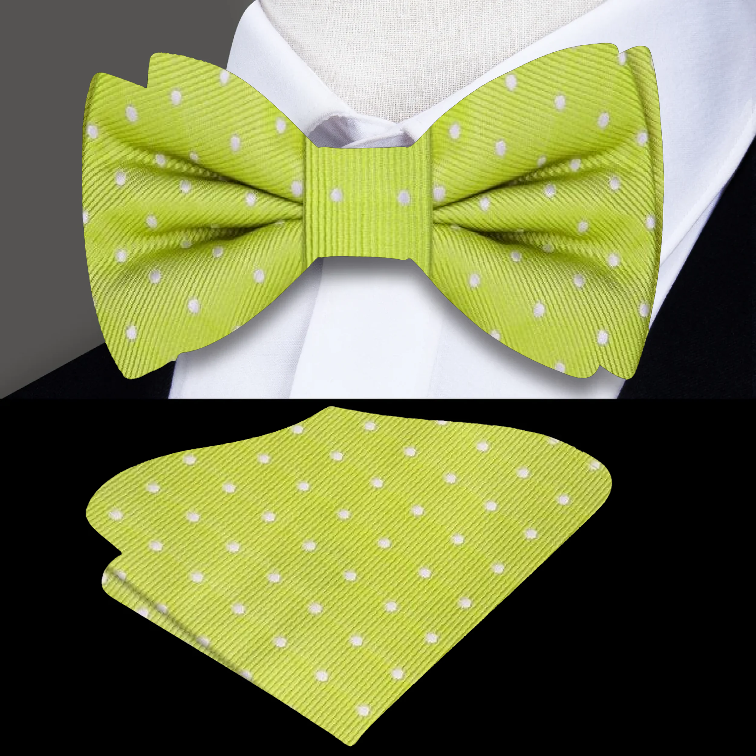 Close-up of navy silk polka dot bow tie with matching pocket square, styled on a white dress shirt