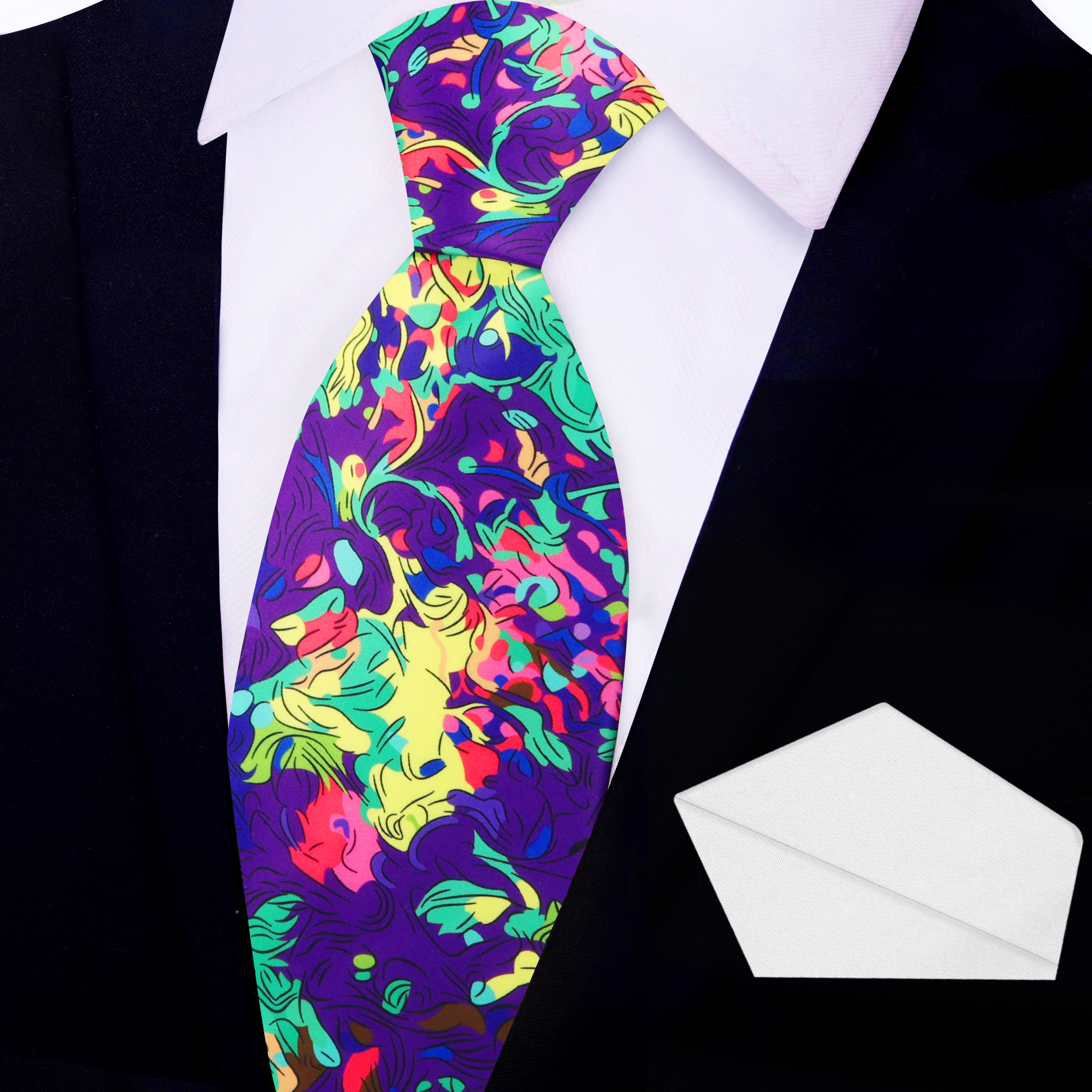 Man wearing the Artisan Mosaic Abstract Tie at a cocktail party, styled with a crisp white shirt.