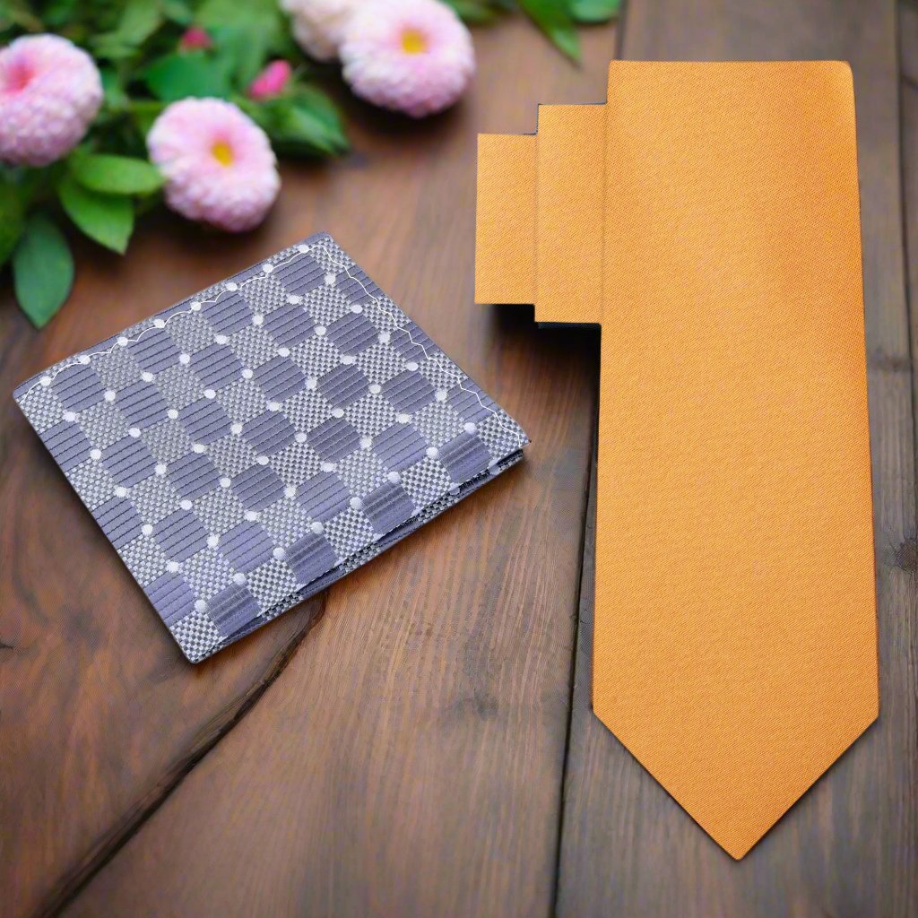 Close-up of marigold orange necktie on white shirt – ideal wedding tie