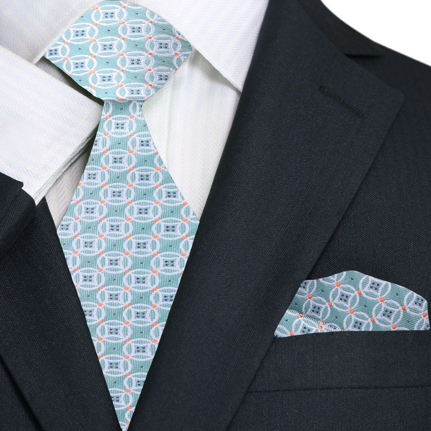 Close-up of Melbourne Geometric Silk Necktie in mint green and orange on a model