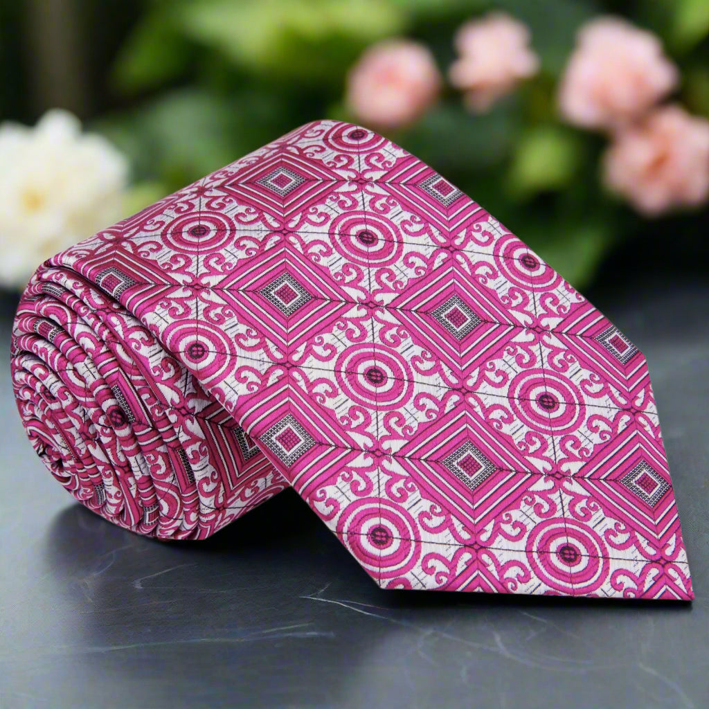 Front view of the Calyptus silk geometric necktie in silver, pink, and black for formal events