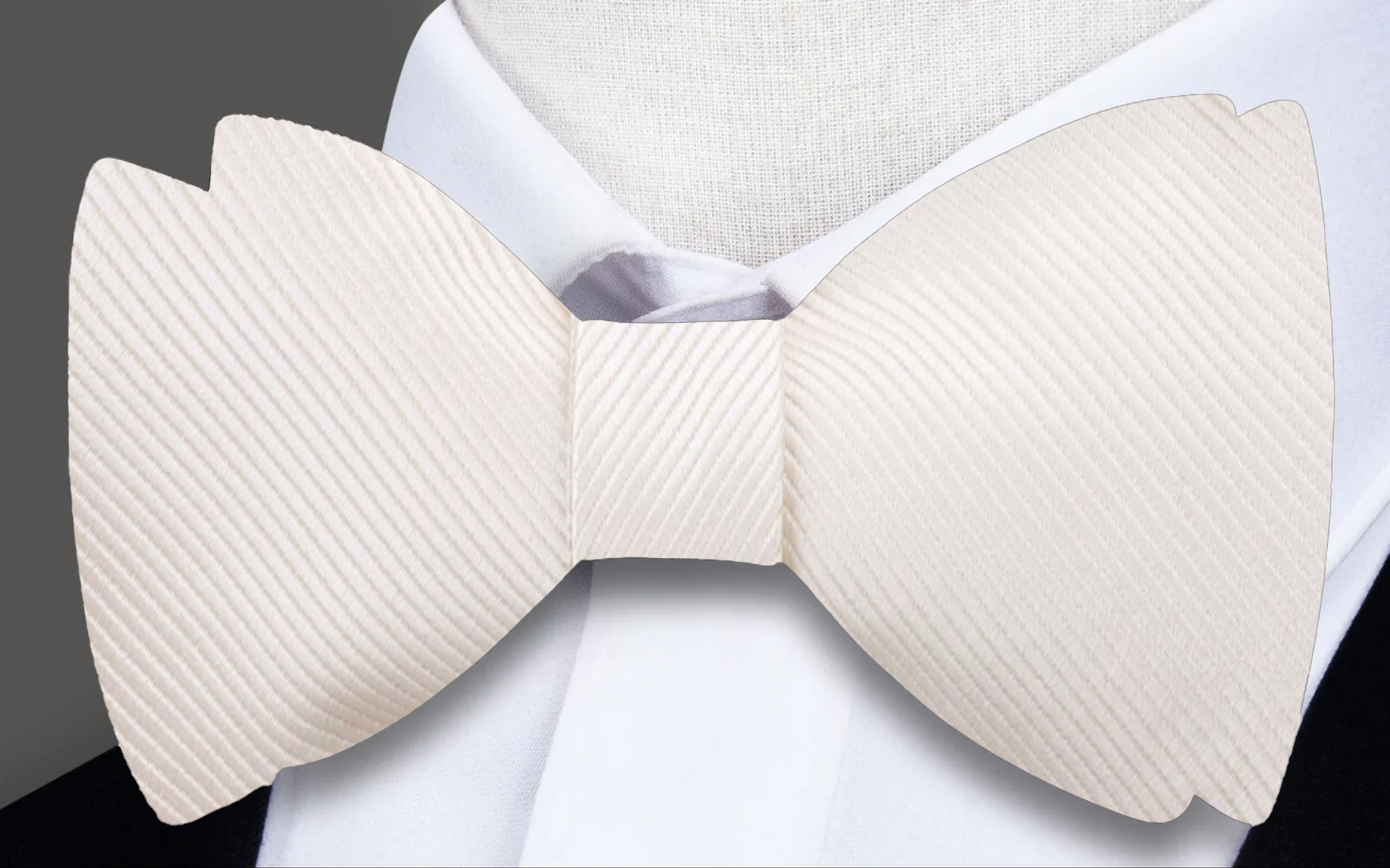 Classic solid color bow tie in royal blue, perfect for formal events.