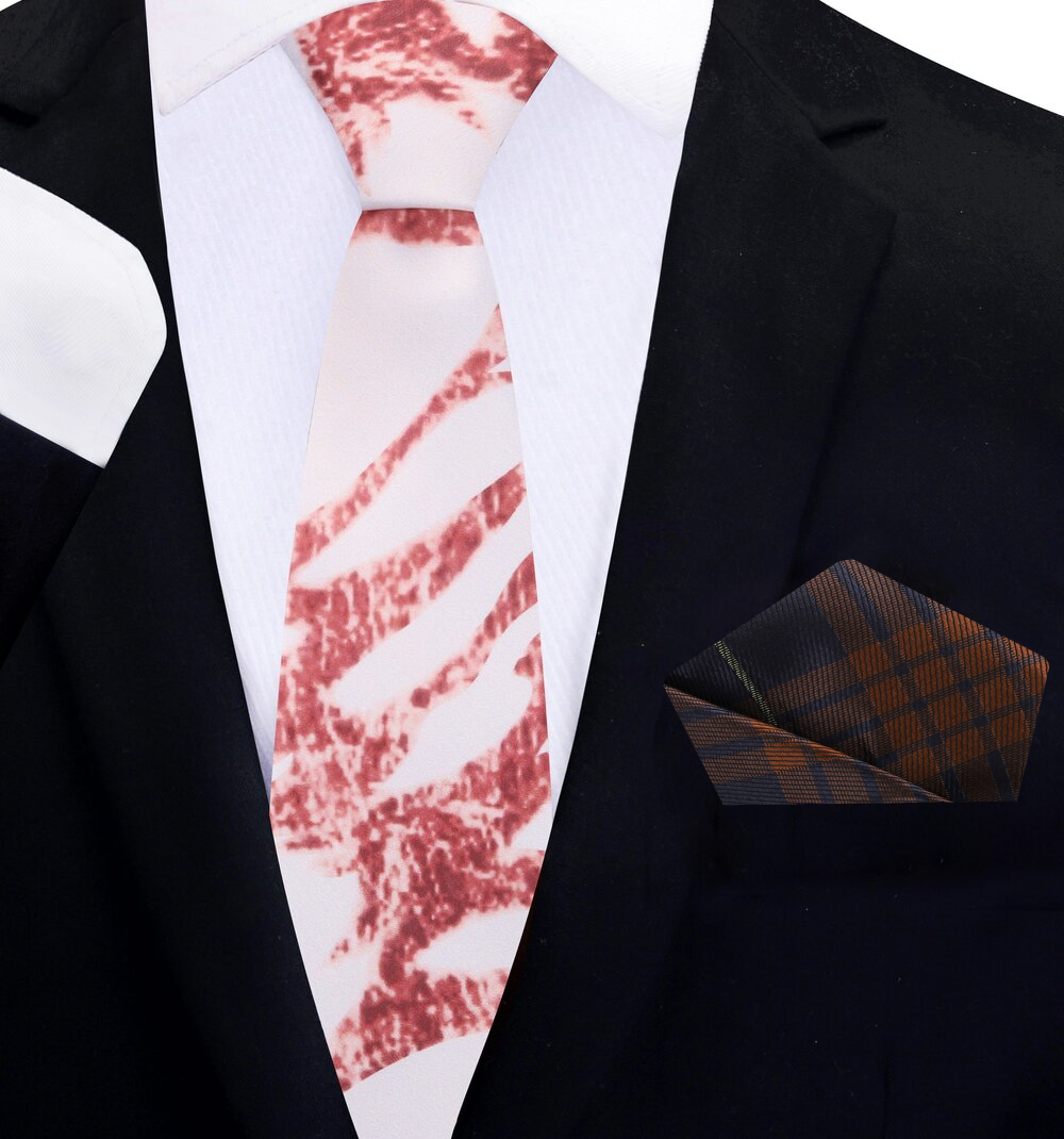 Stylish marble tie paired with light grey shirt and navy suit—ideal for cocktail parties