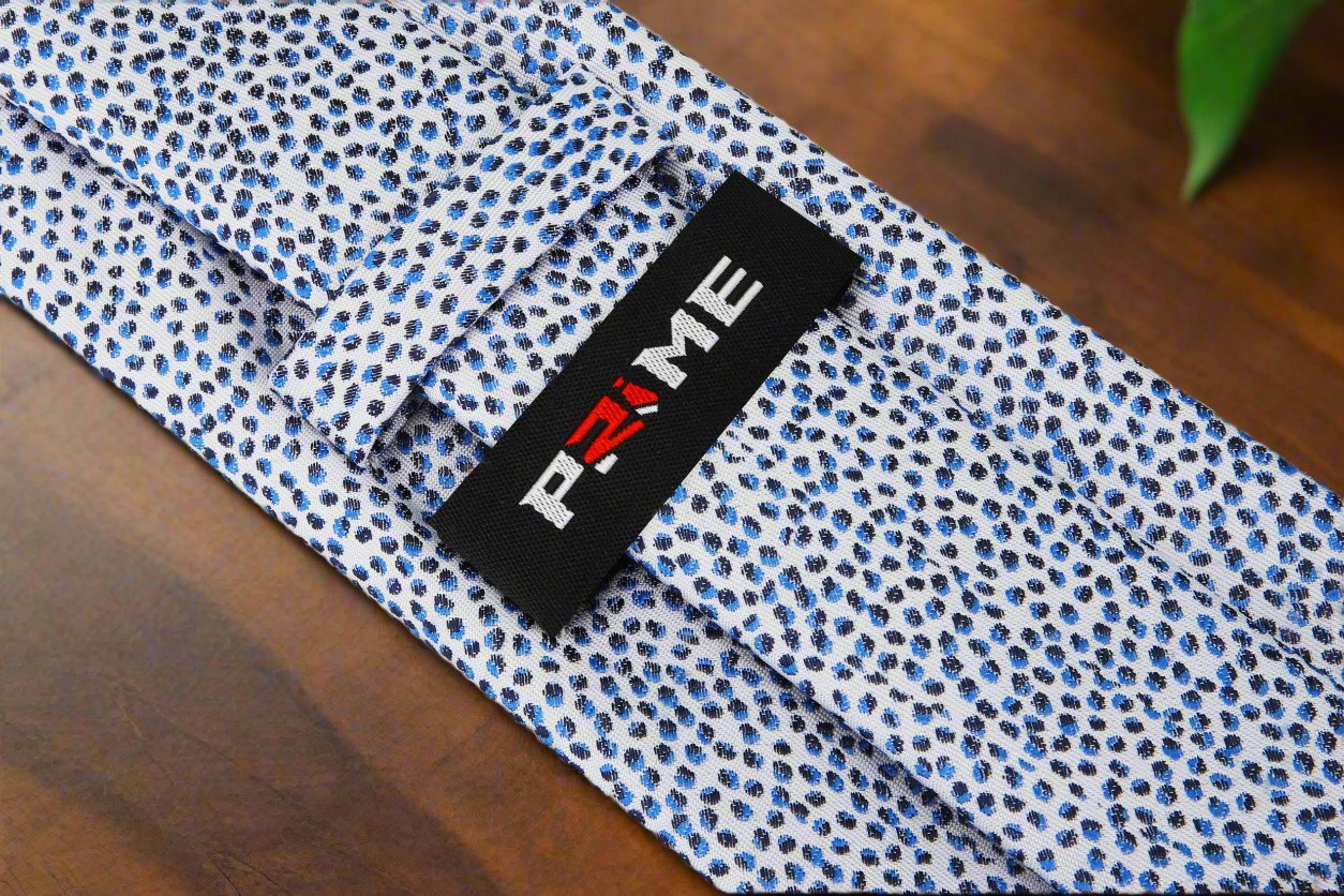 Silk necktie styled with a light blue dress shirt for business meetings