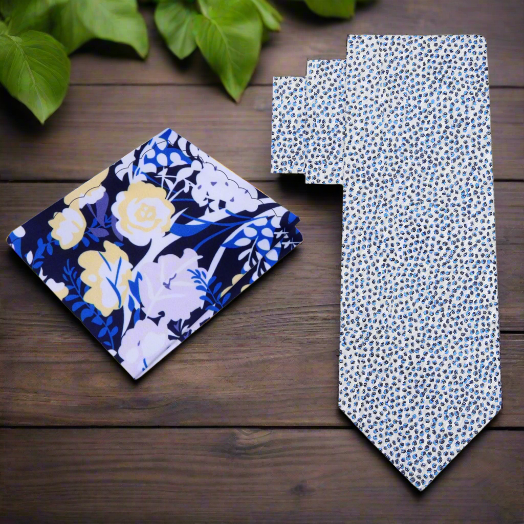 Close-up of modern silk tie with pebbles pattern in blue and black