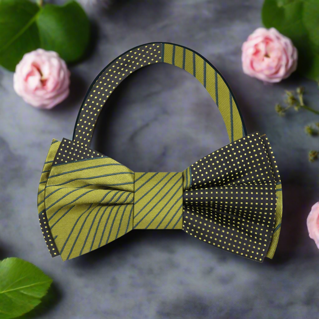 Close-up view of the olive silk bow tie showcasing its intricate lined and dotted abstract pattern.