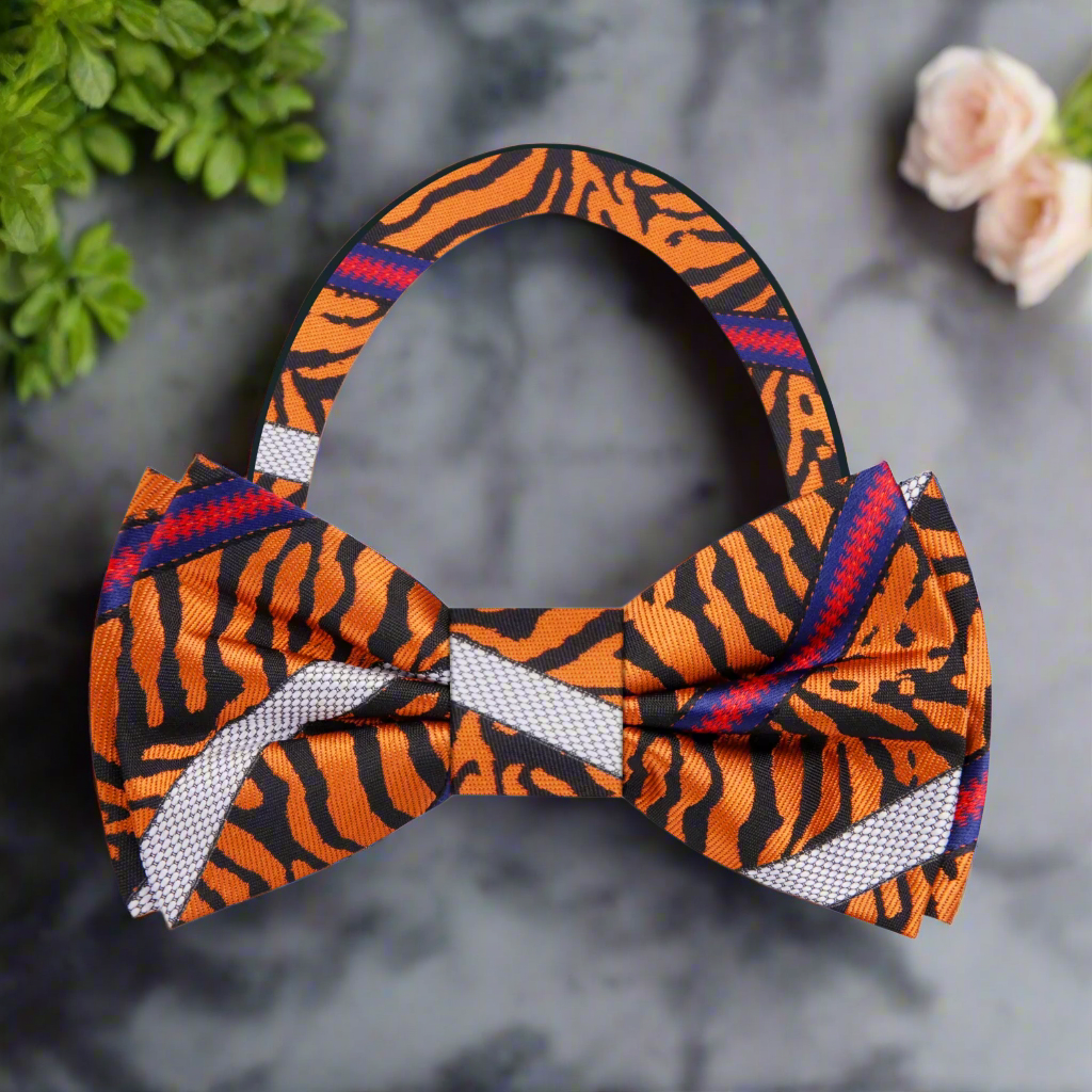 Man wearing an Orange and Black Tiger Stripe Bow Tie at a cocktail party