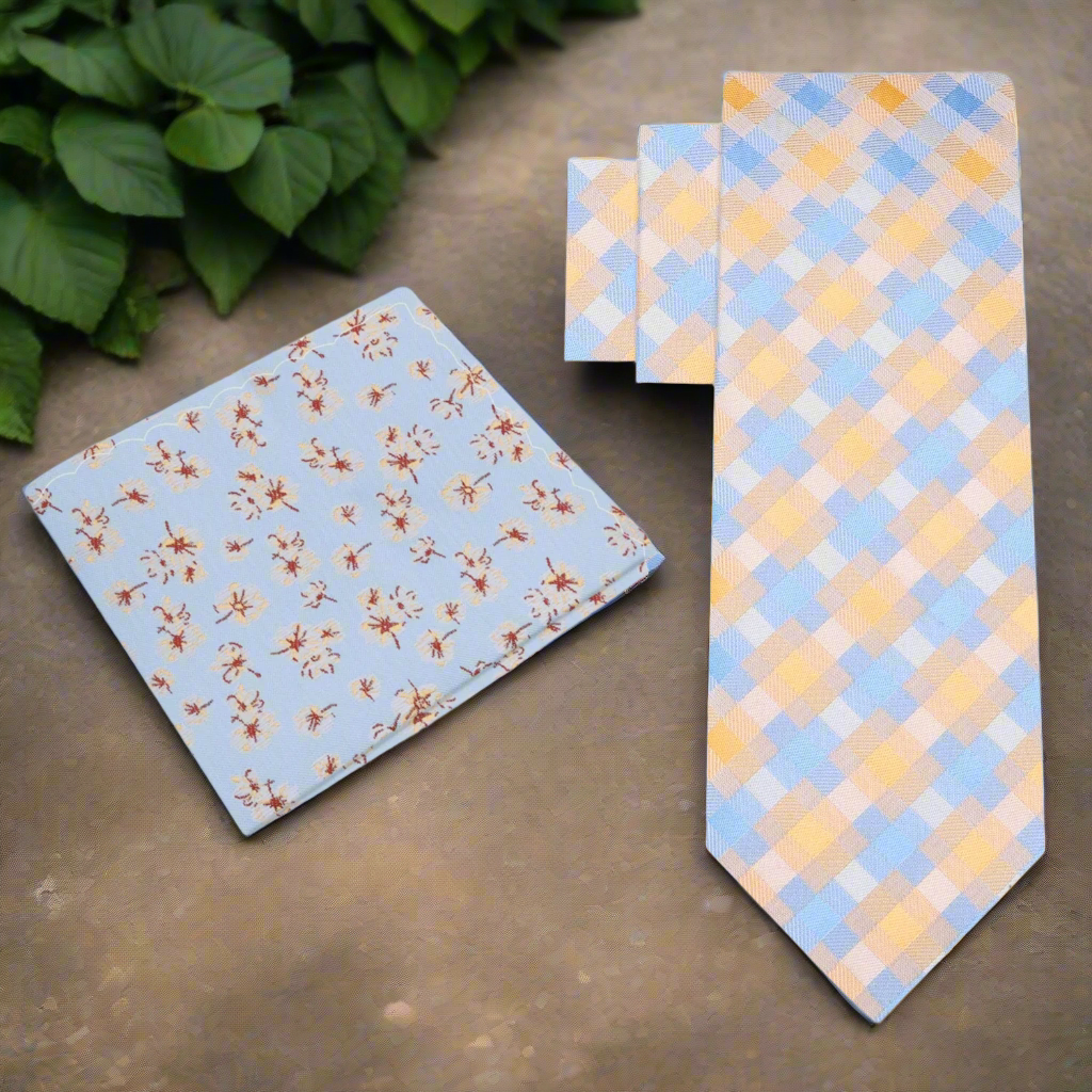 Close-up of vibrant modern plaid silk necktie in orange and light blue for mens fashion