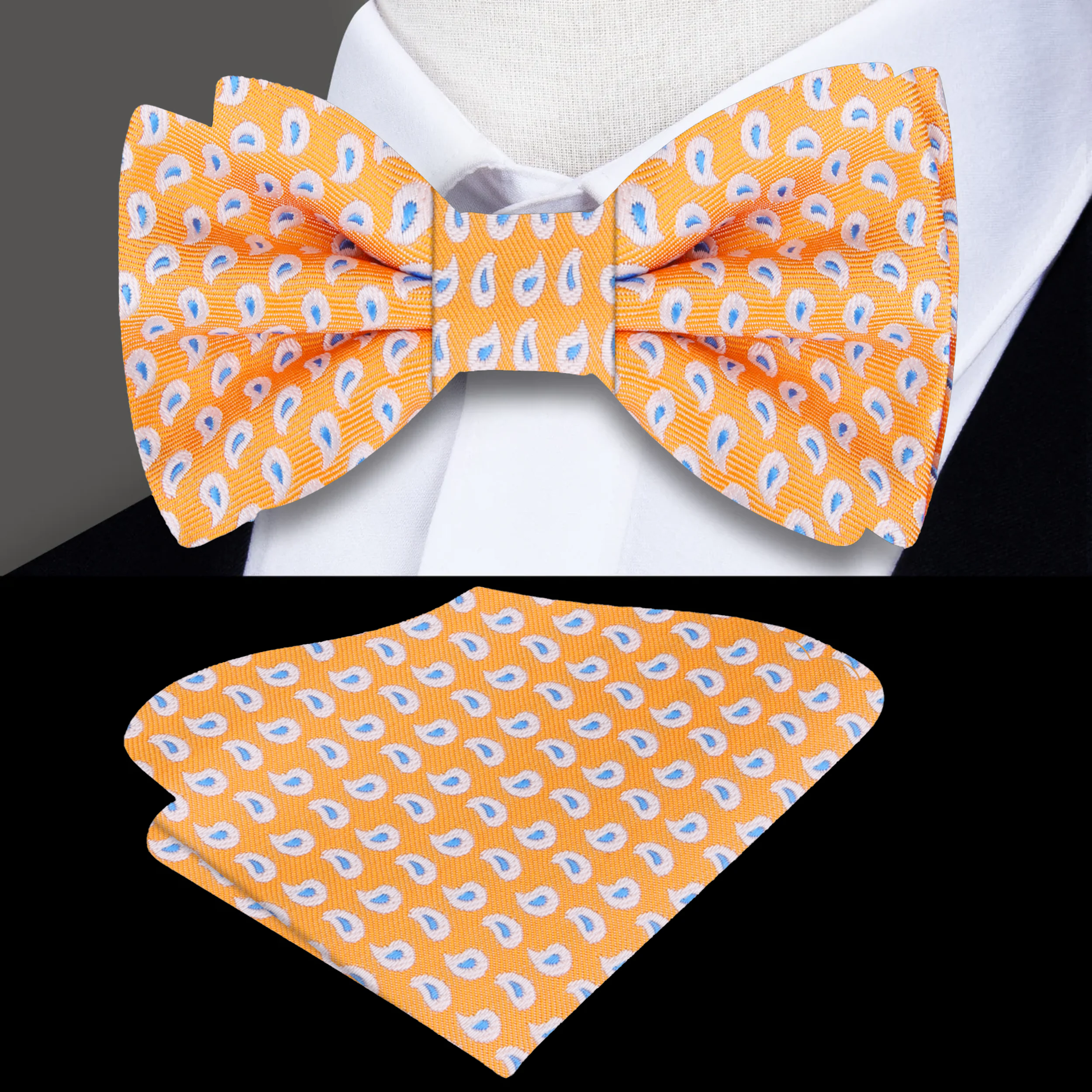 Close-up of the light blue paisley silk bow tie, highlighting the delicate patterns and soft fabric.