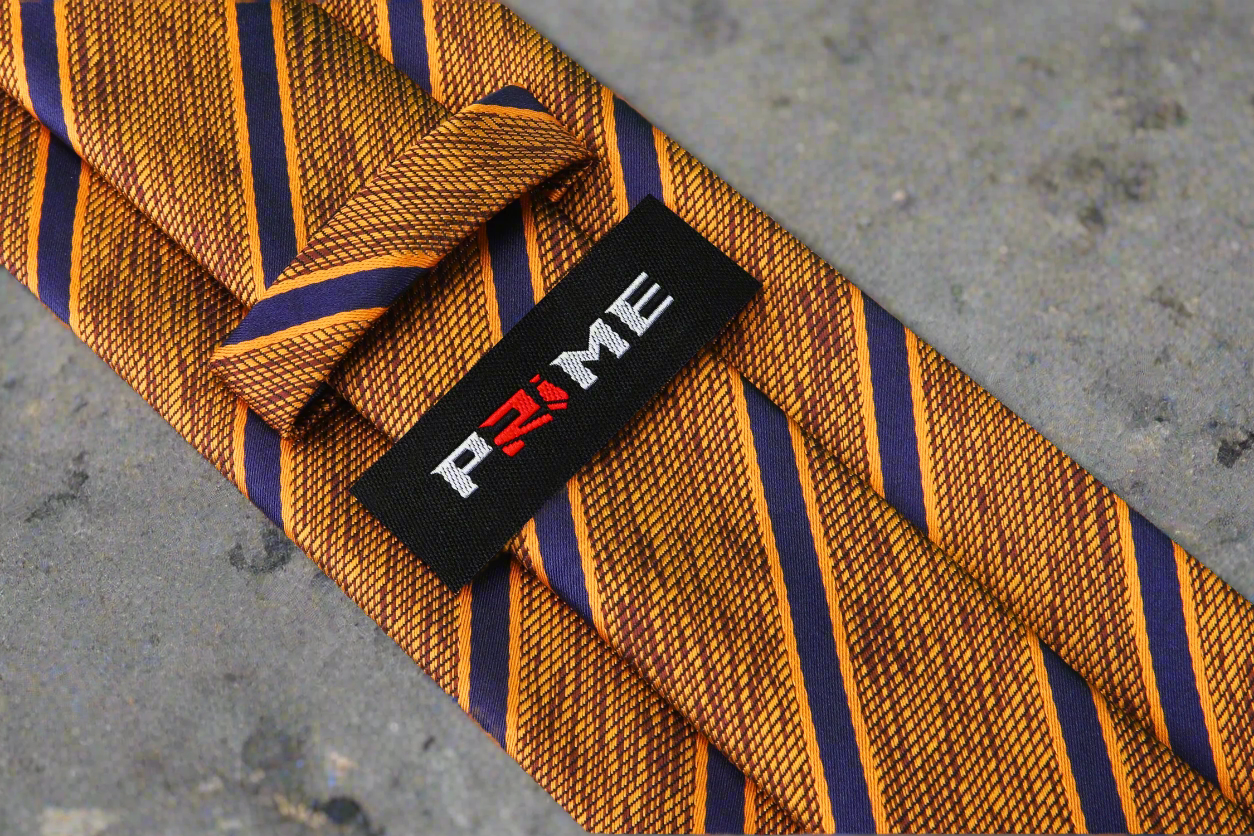 Stylish mens striped tie paired with a navy suit for a professional look
