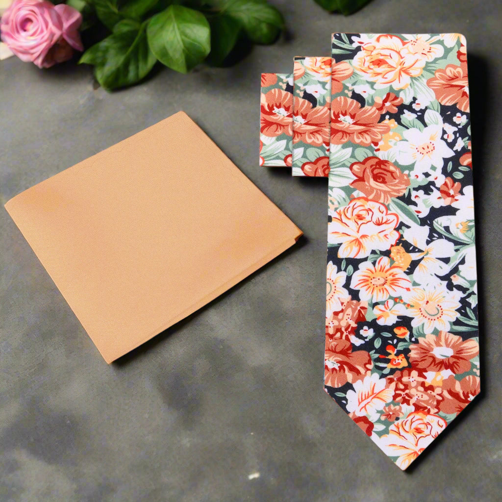 Close-up of floral silk tie with autumn colors, ideal for garden parties