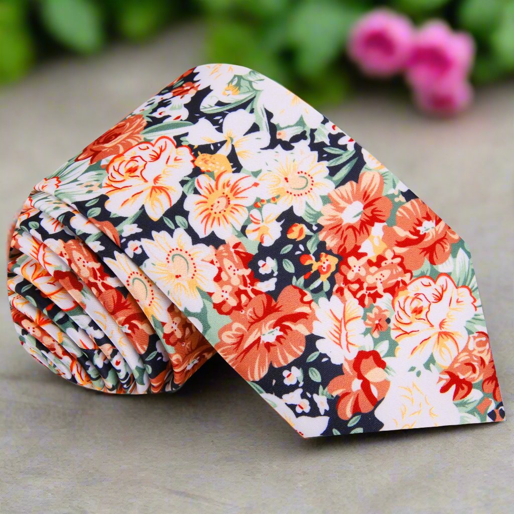 Close-up of floral silk tie with autumn colors, ideal for garden parties