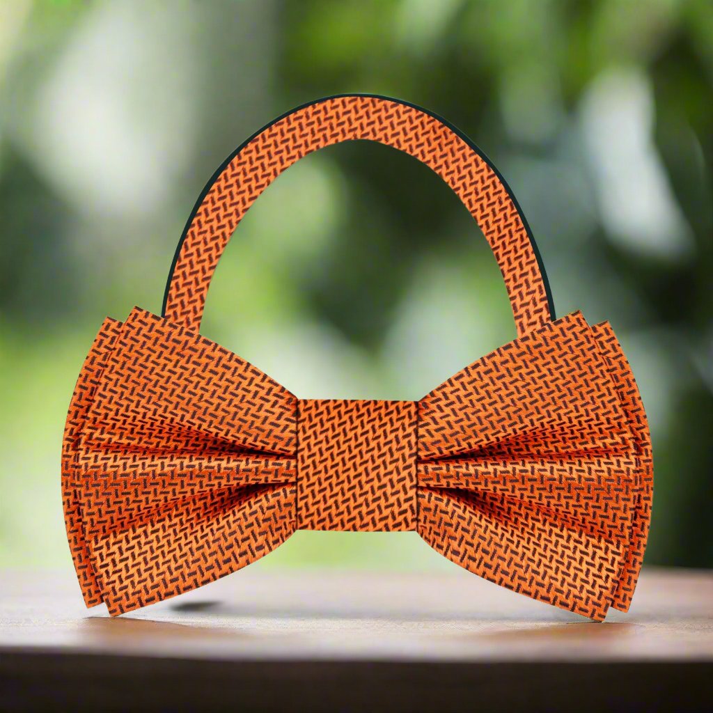 Close-up of the Cider Canyon Elegance Bow Tie highlighting its silk texture and intricate crosshatch pattern.