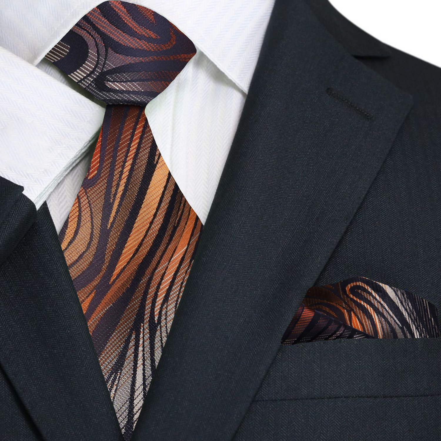 Full shot of tie and pocket square styled on white shirt and charcoal suit