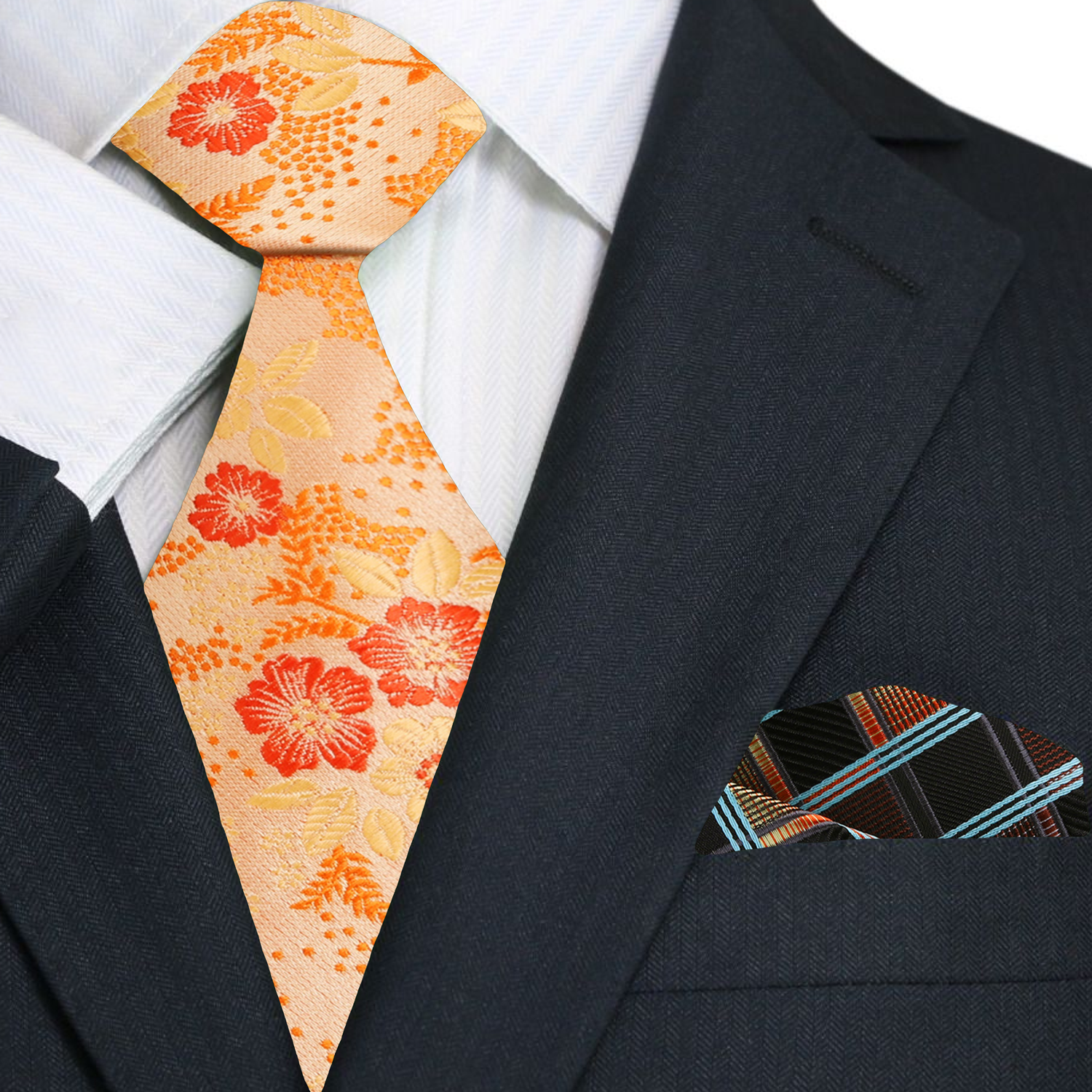 Mens floral tie styled with a navy suit, highlighting the contrast between the vibrant orange and deep blue.