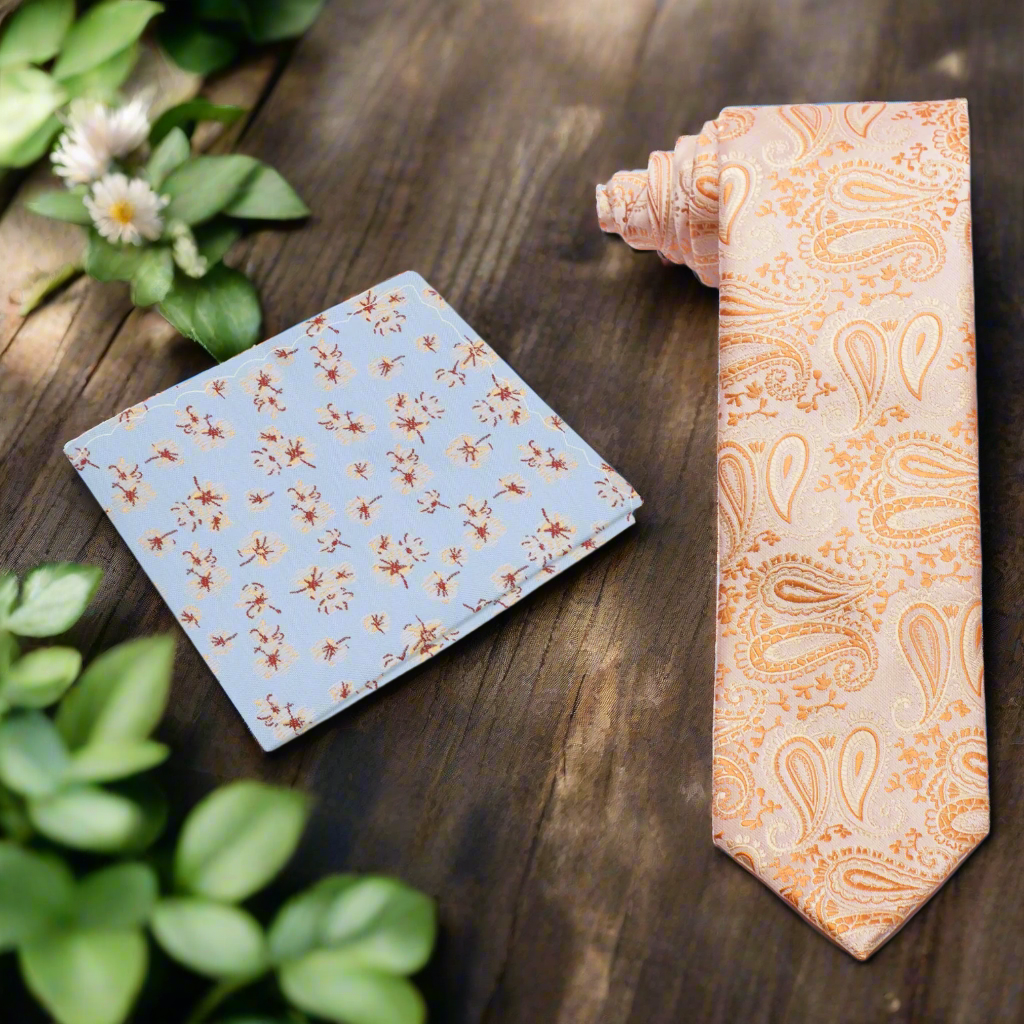 Coral paisley tie and matching pocket square set, perfect for weddings and summer events.