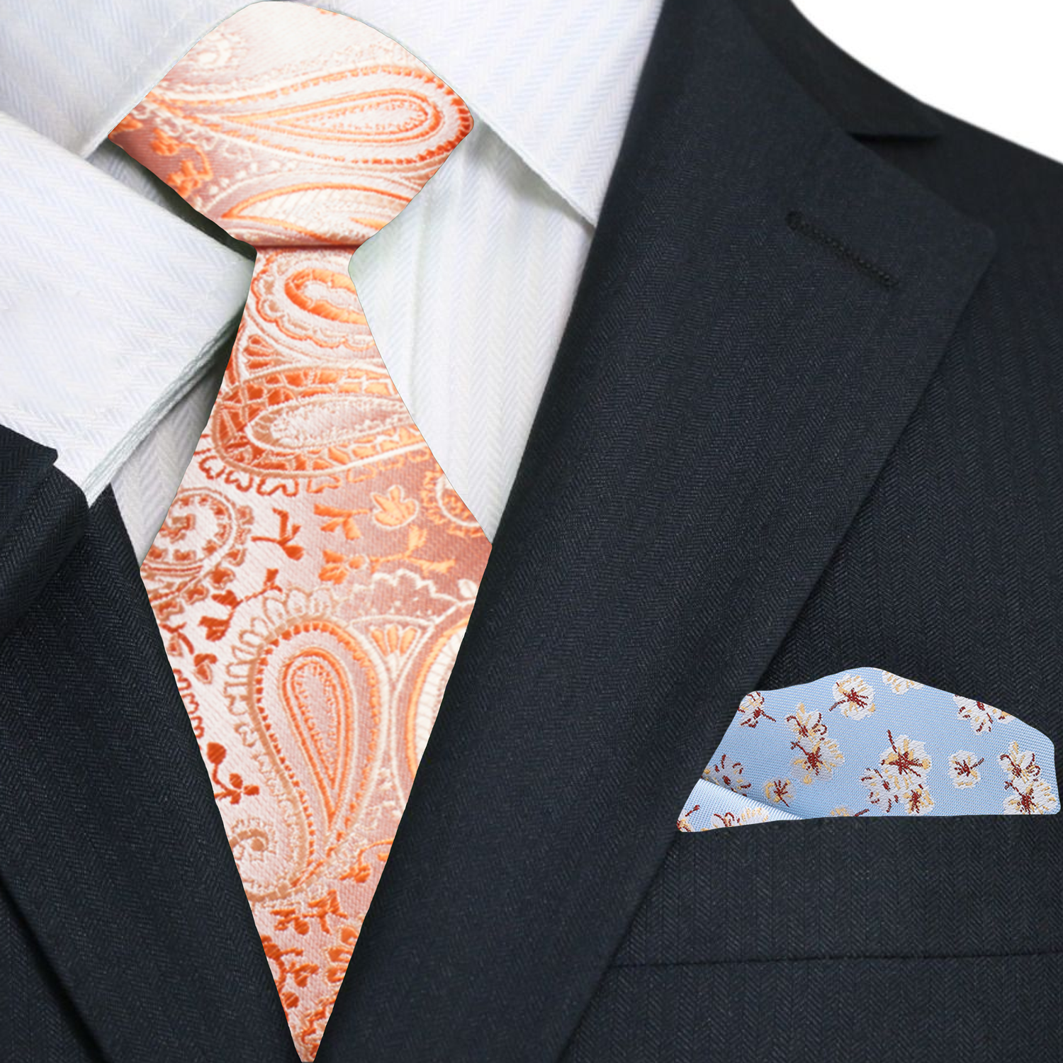 Coral silk tie paired with a light grey suit, showcasing a refined look for formal occasions.
