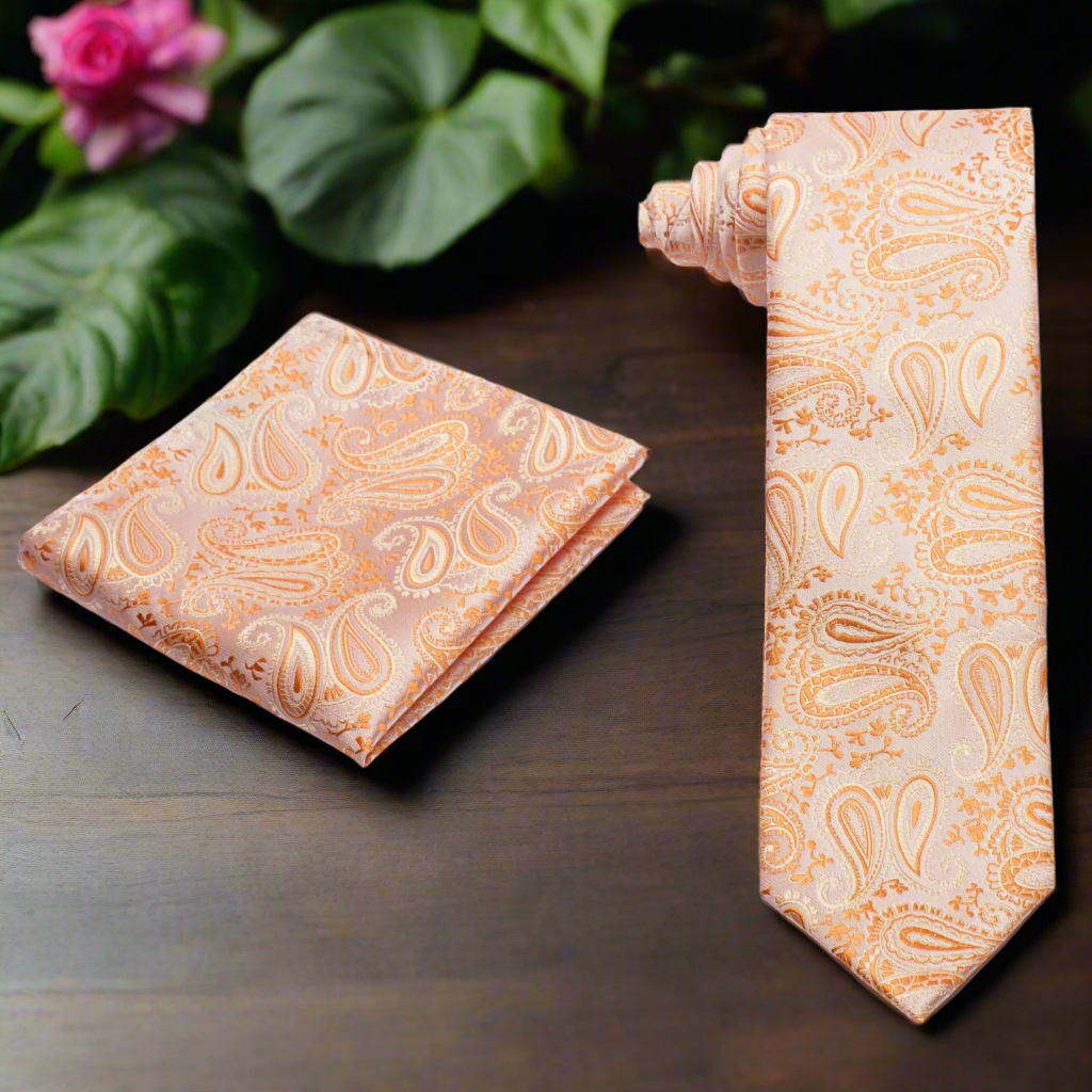 Coral paisley tie and matching pocket square set, perfect for weddings and summer events.