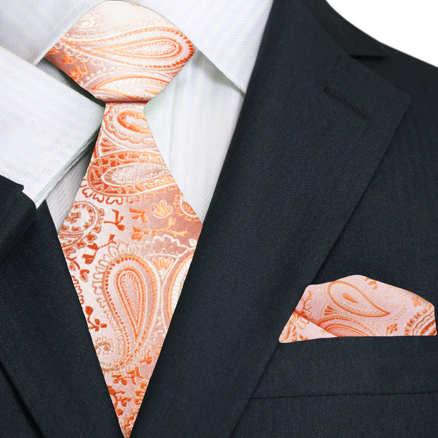 Coral silk tie paired with a light grey suit, showcasing a refined look for formal occasions.