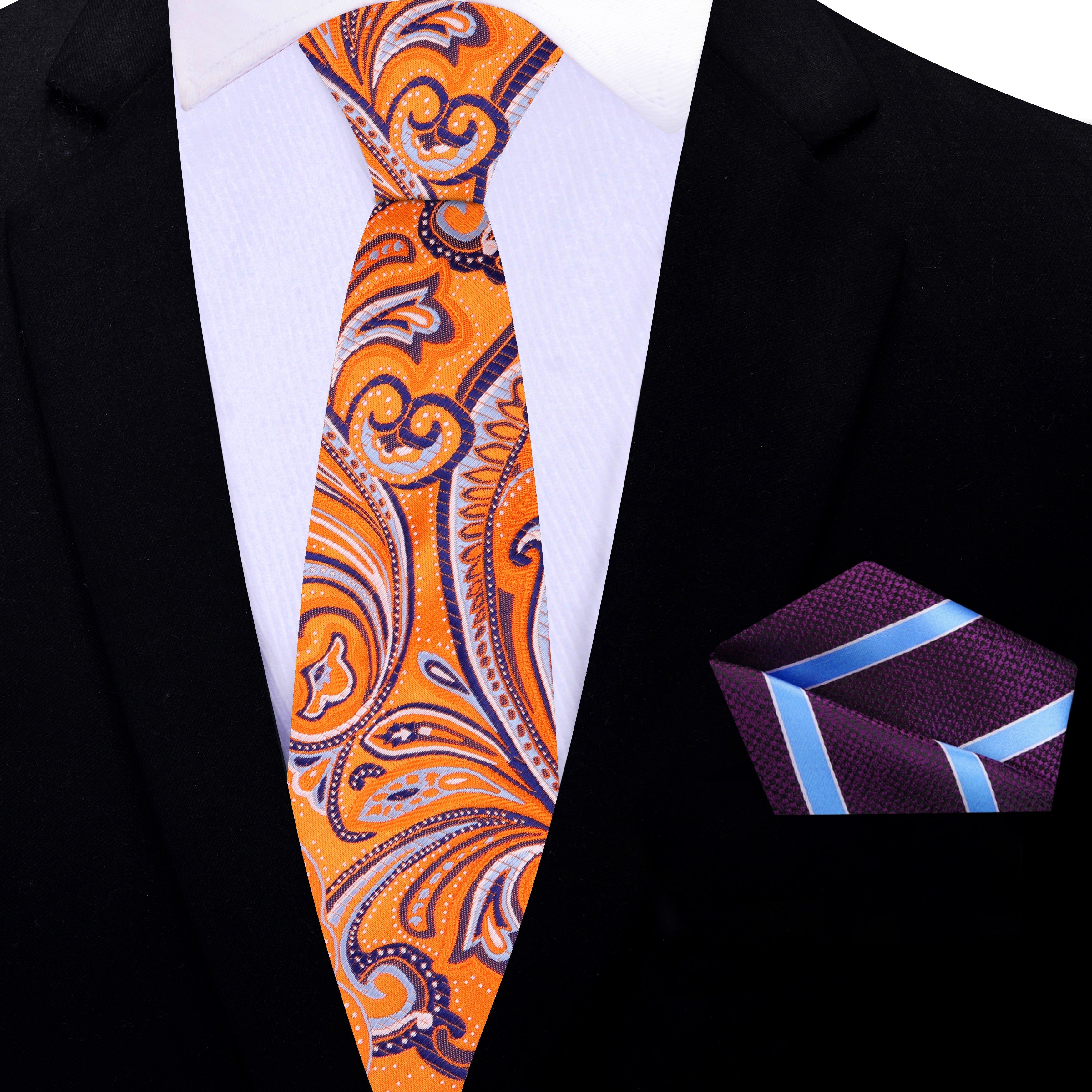 Vibrant orange paisley silk tie with detailed pattern for weddings and galas