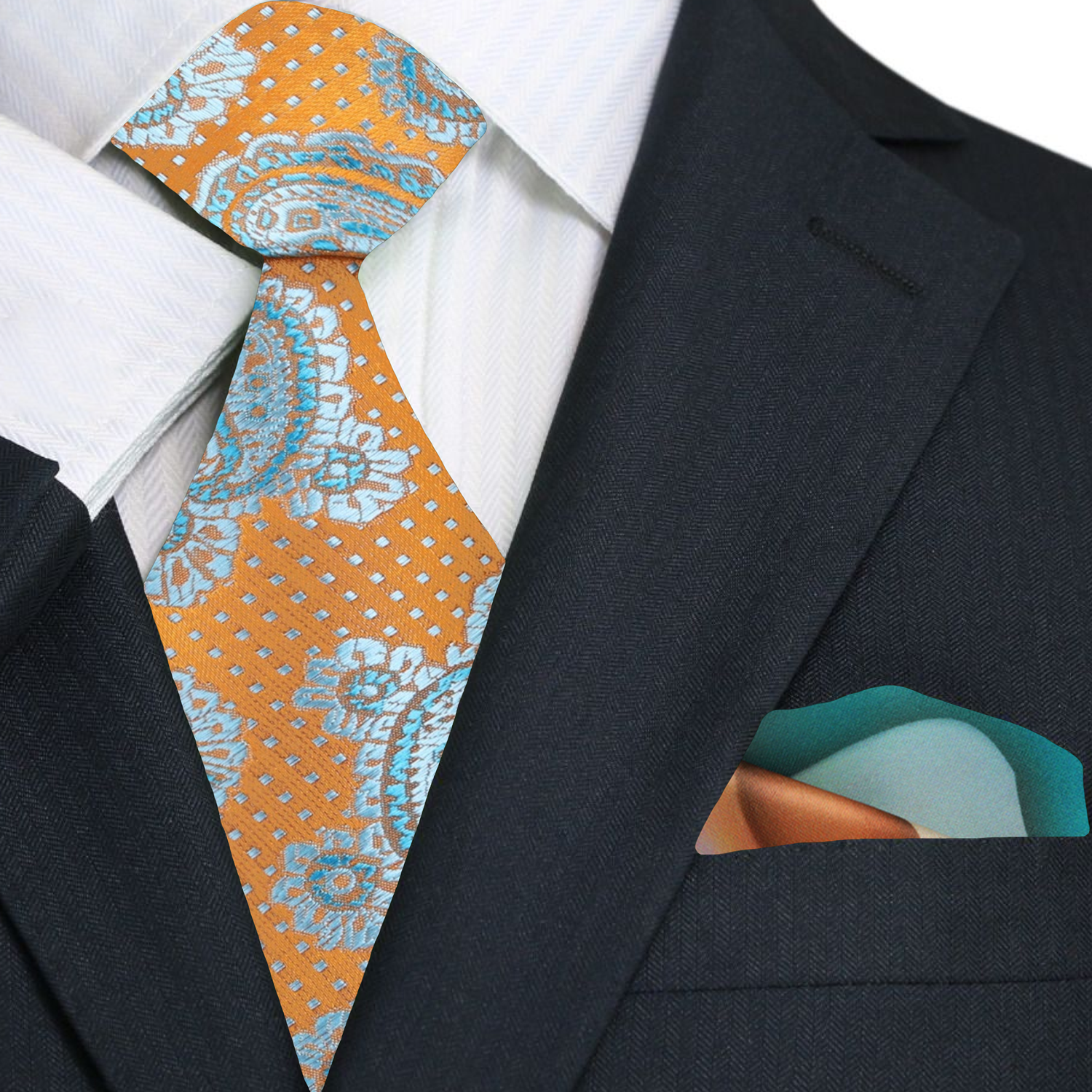 Model wearing orange paisley necktie with a navy suit at a wedding