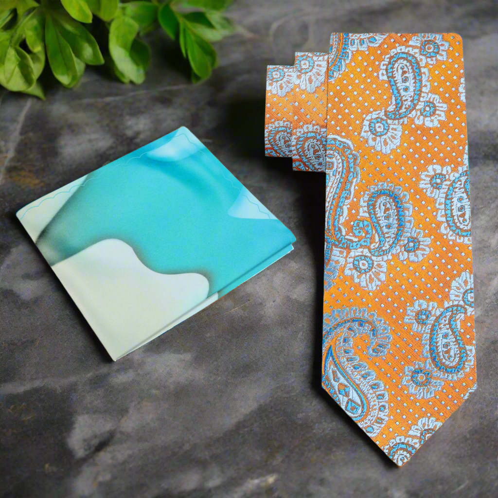 Detail shot of necktie paired with a white dress shirt and pocket square