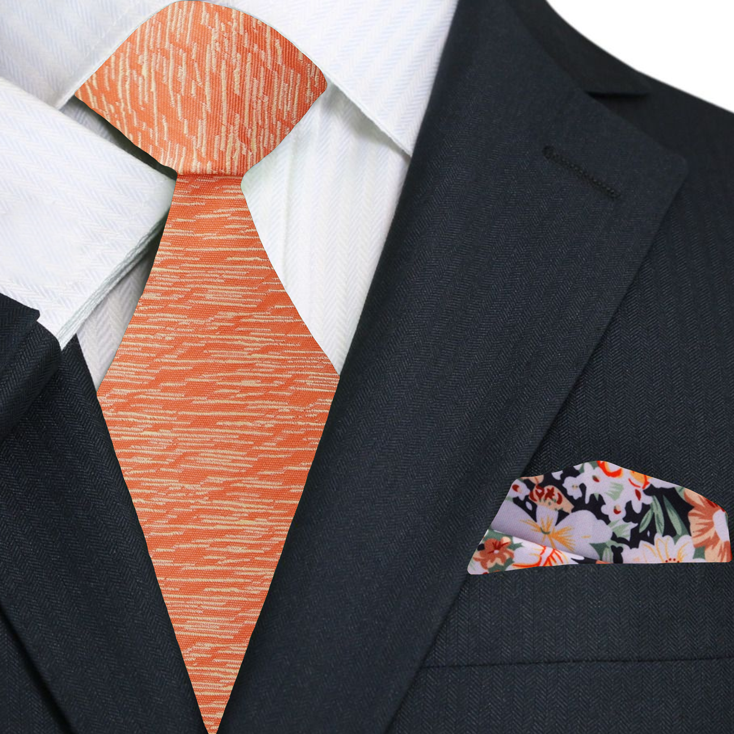 Man wearing an orange silk necktie with navy suit for a wedding