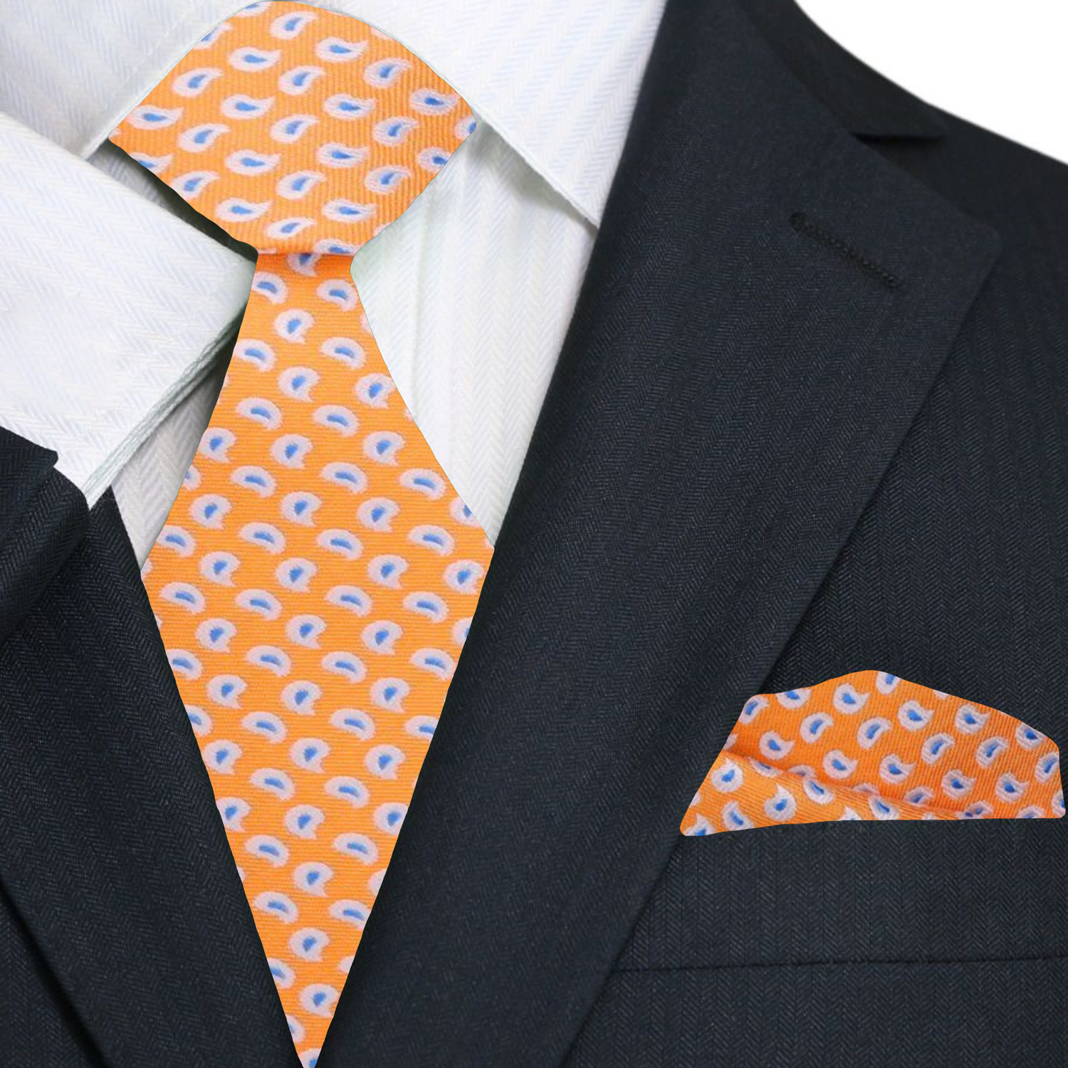 Matching paisley silk handkerchief and tie set on a stylish mens dress shirt
