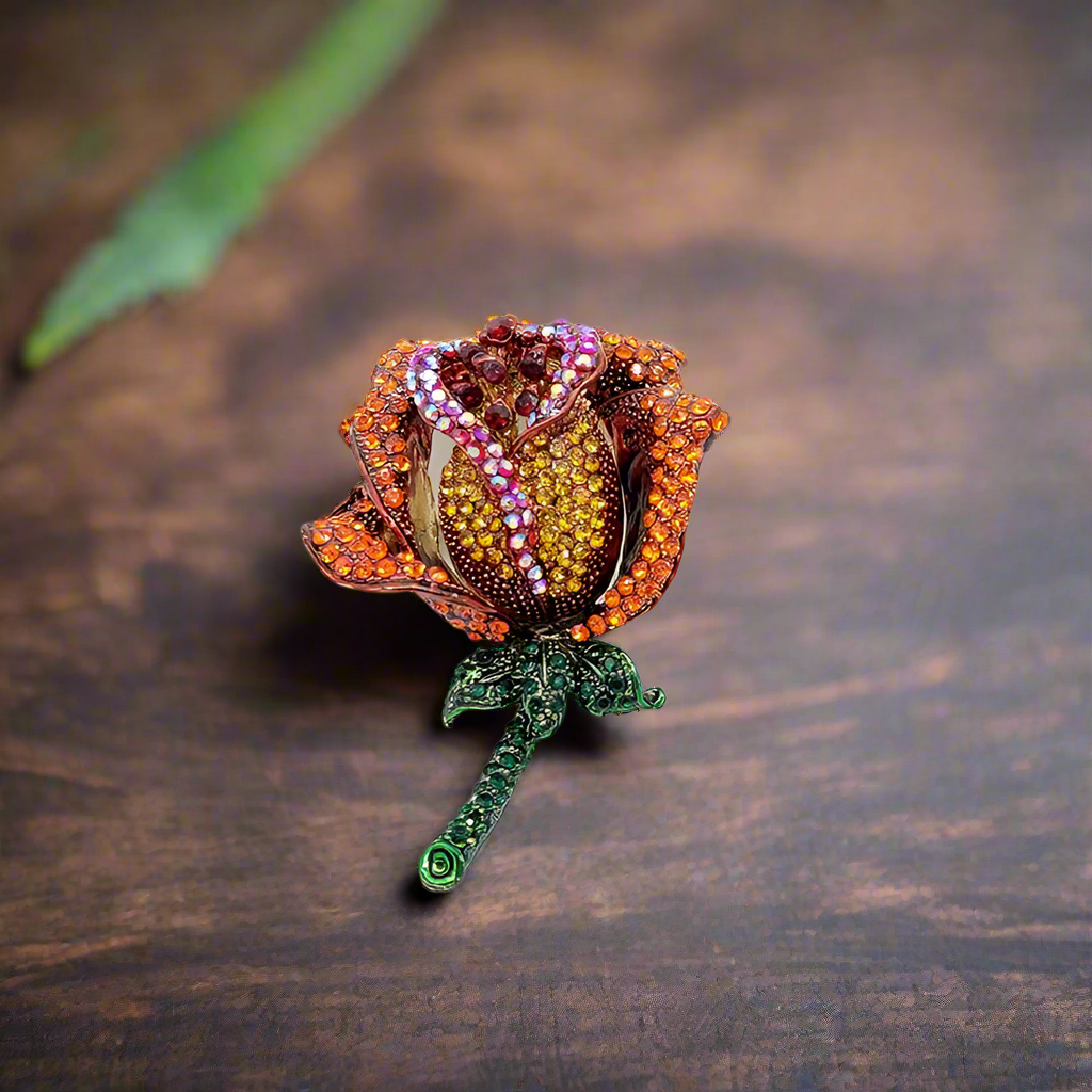 Rose lapel pin displayed with a navy blue suit, a perfect accessory for weddings.