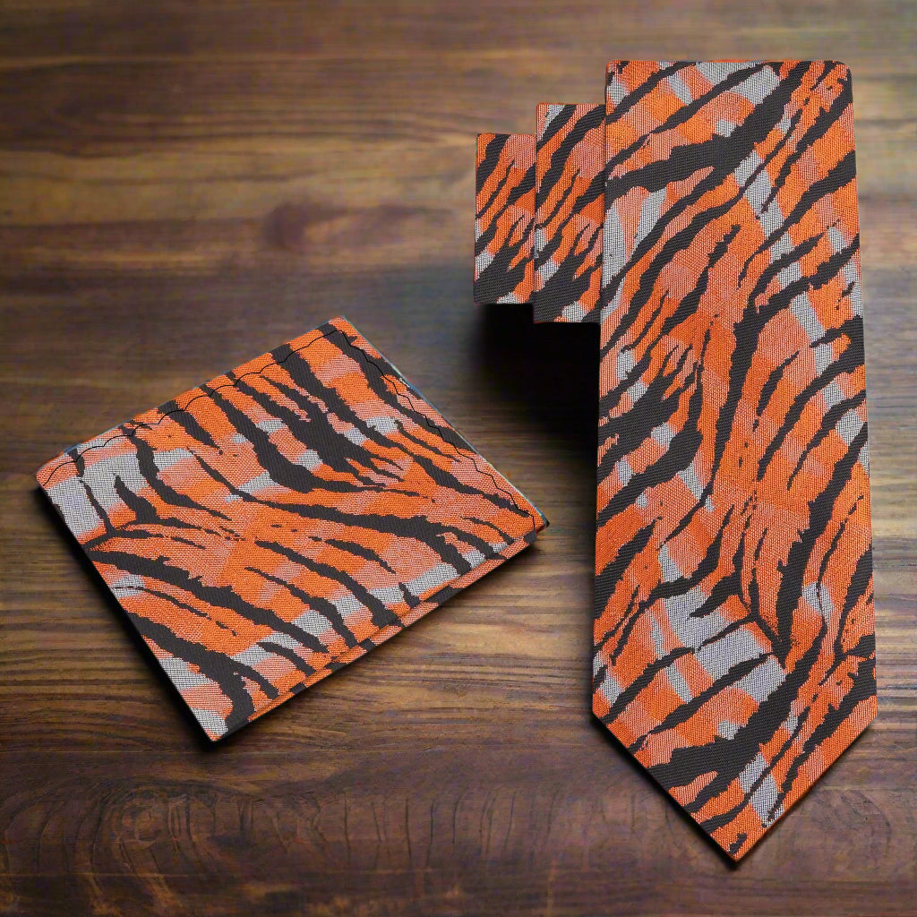 Bold tiger print silk tie showcasing vibrant colors and patterns, ideal for formal occasions.