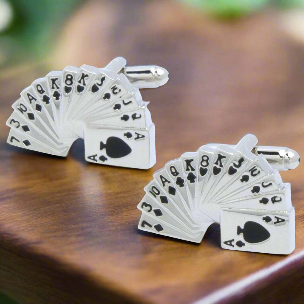 Man wearing gaming themed cufflinks during a casino night event