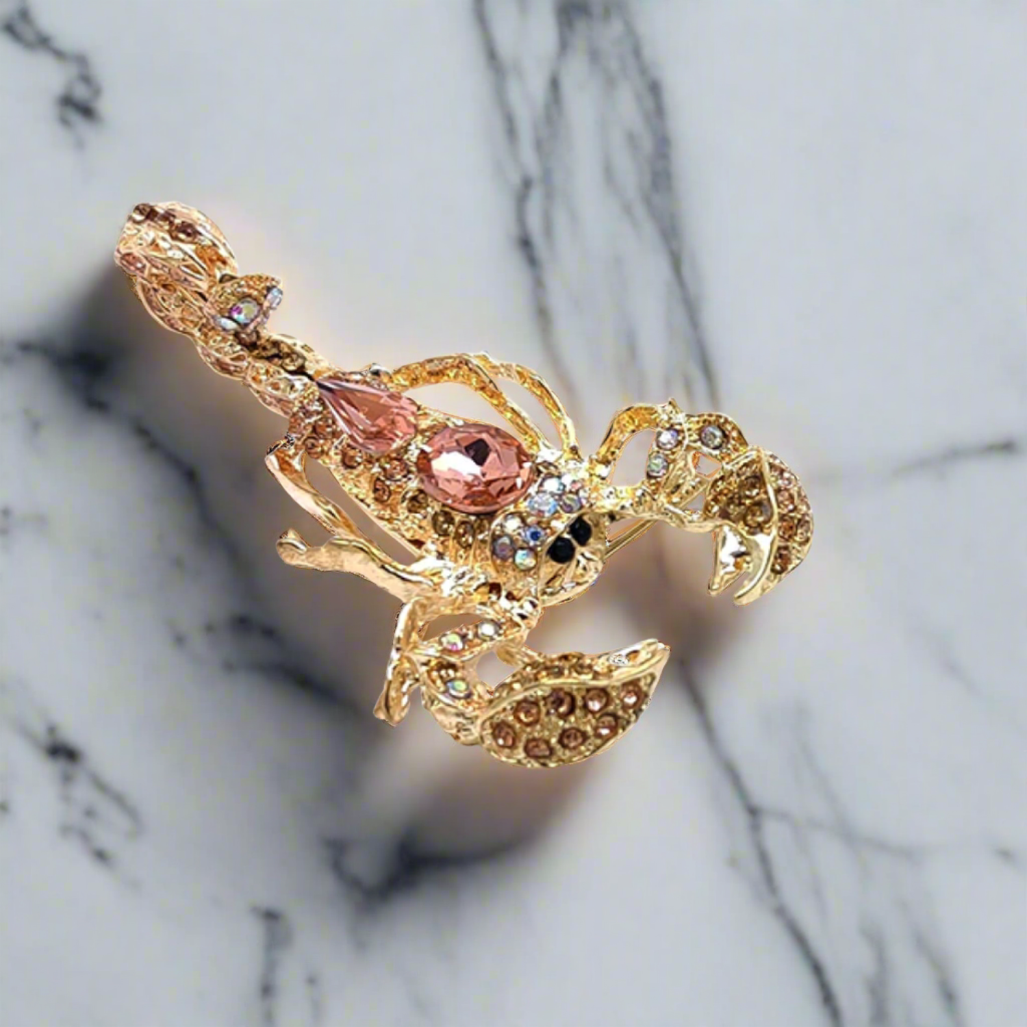 Styled image of a gemstone animal lapel pin attached to a blazer, highlighting its luxurious appearance