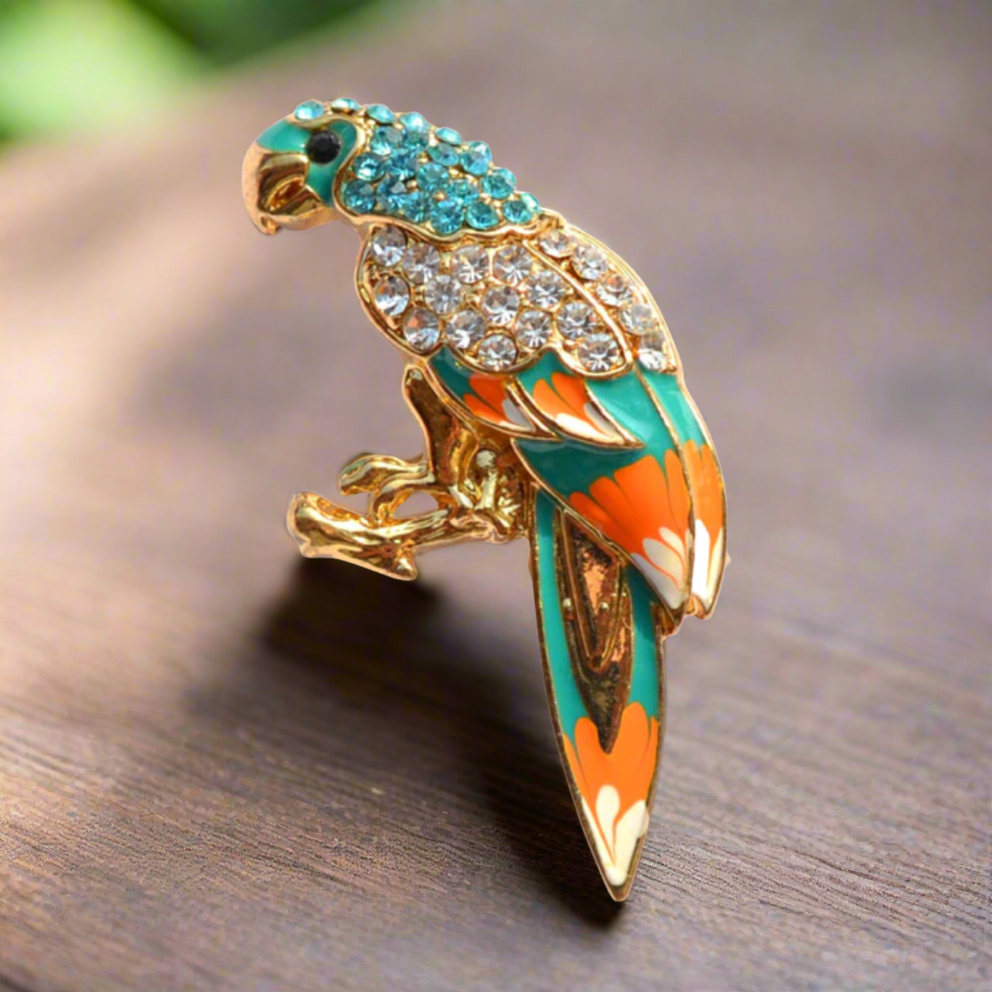 Front view of a gemstone exotic animal lapel pin with lion design, showcasing intricate detail and sparkling gemstones