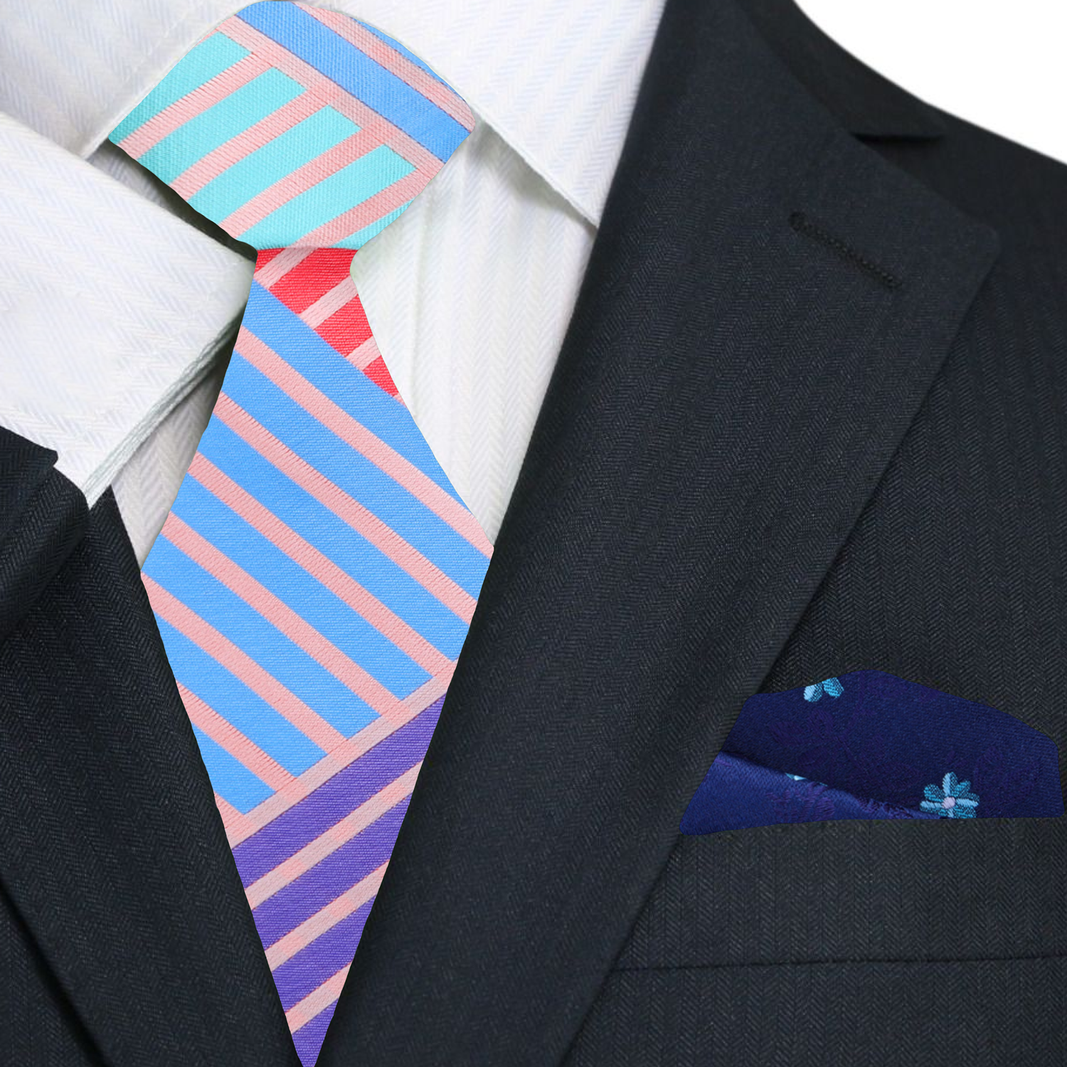 Styled image of the silk tie paired with a white dress shirt and navy suit