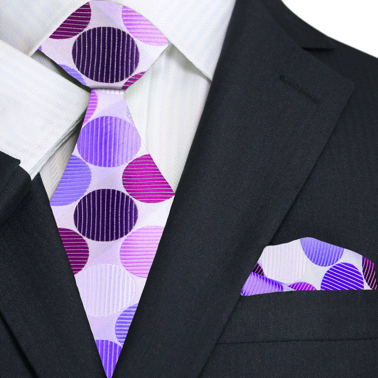 Large polka dot silk necktie in vibrant colors, showcasing the bold pattern against a white shirt.