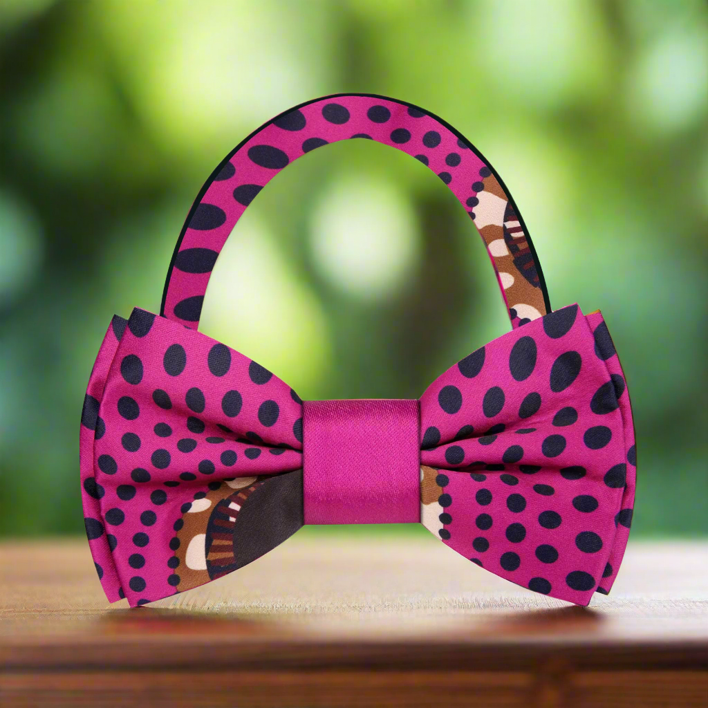 Close-up of a silk bow tie featuring Kente-inspired designs, perfect for cultural celebrations.