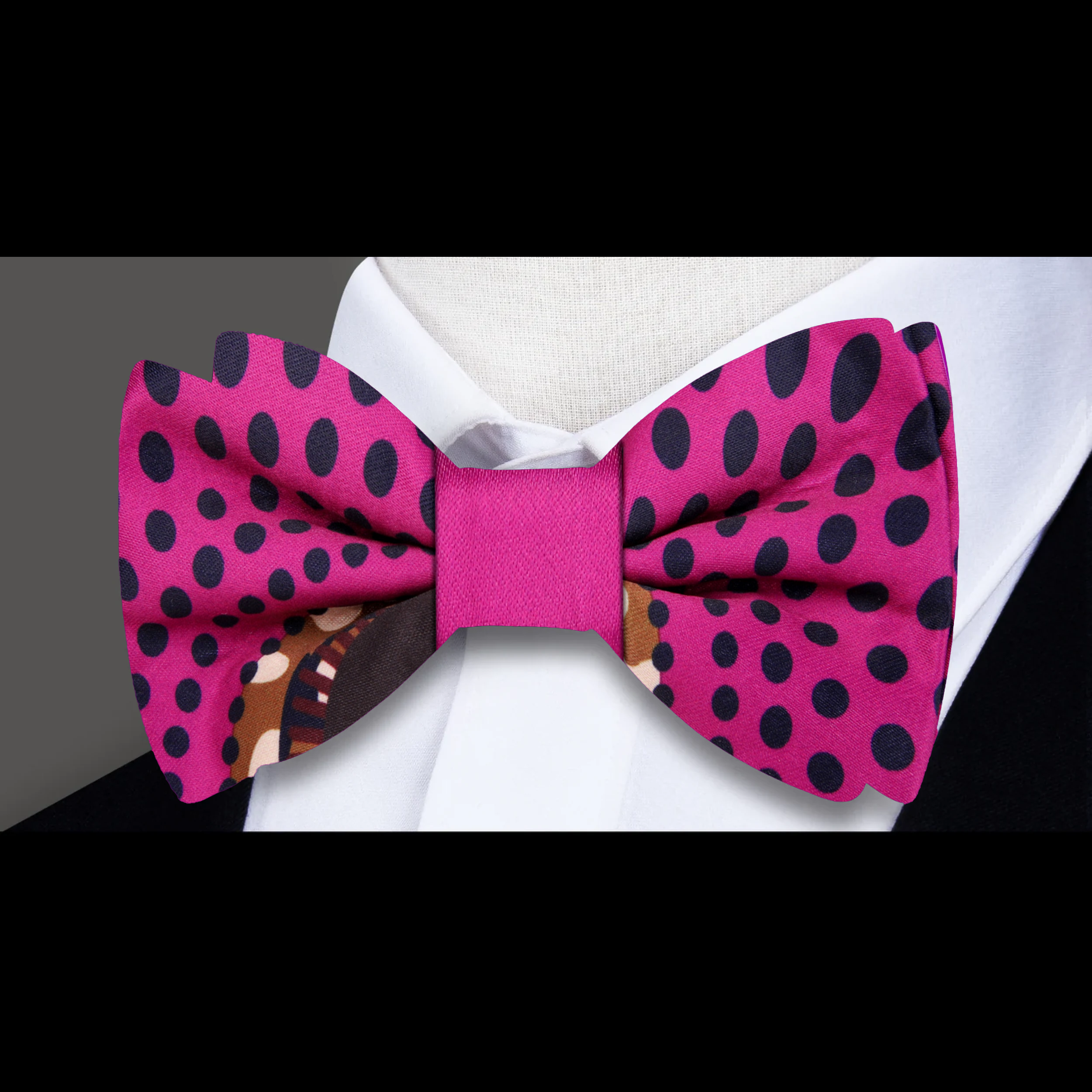 Stylish Kente bow tie displayed with a crisp white shirt, demonstrating its vibrancy and elegance.
