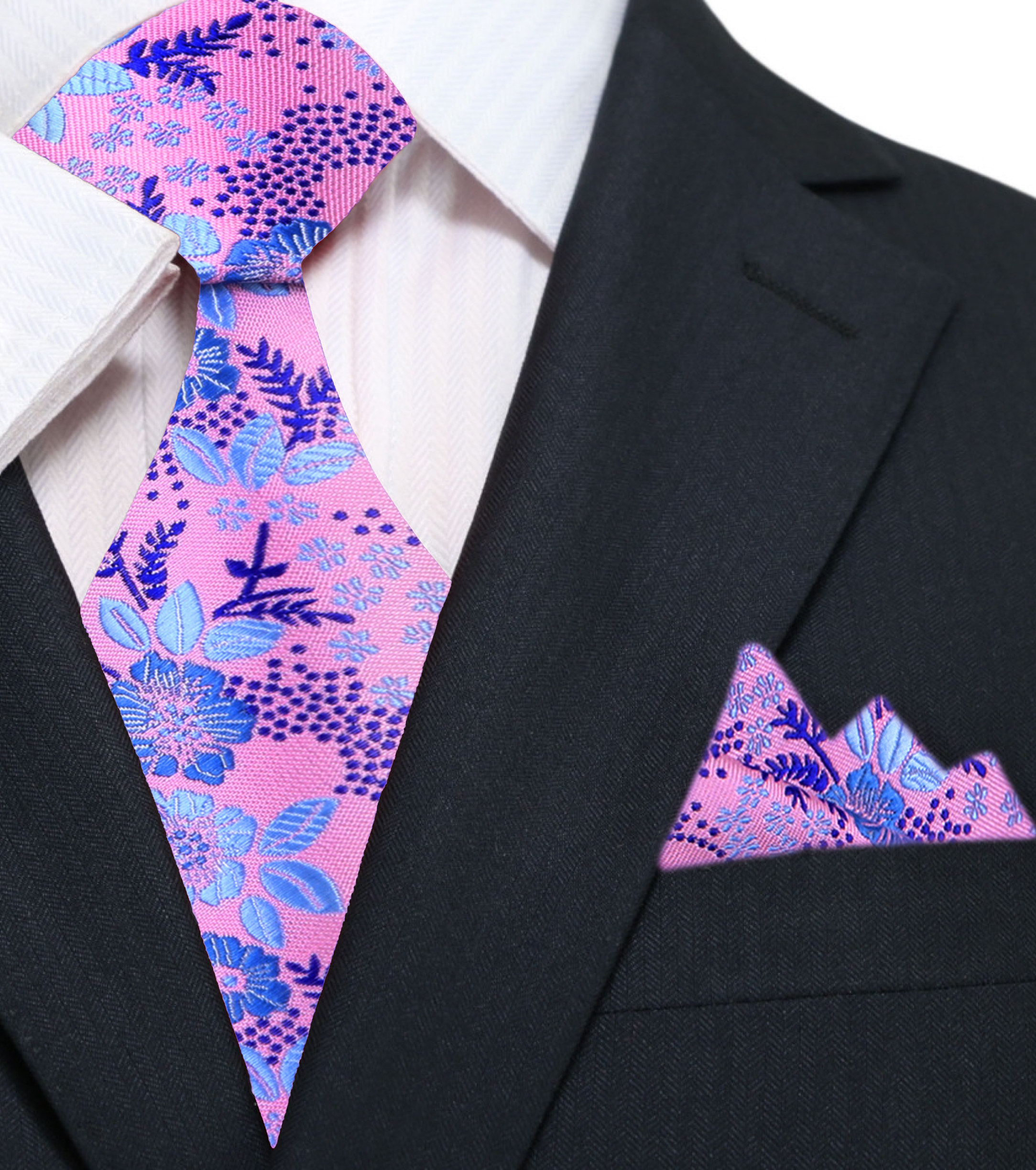 Man wearing floral necktie with a white shirt and navy suit for a wedding