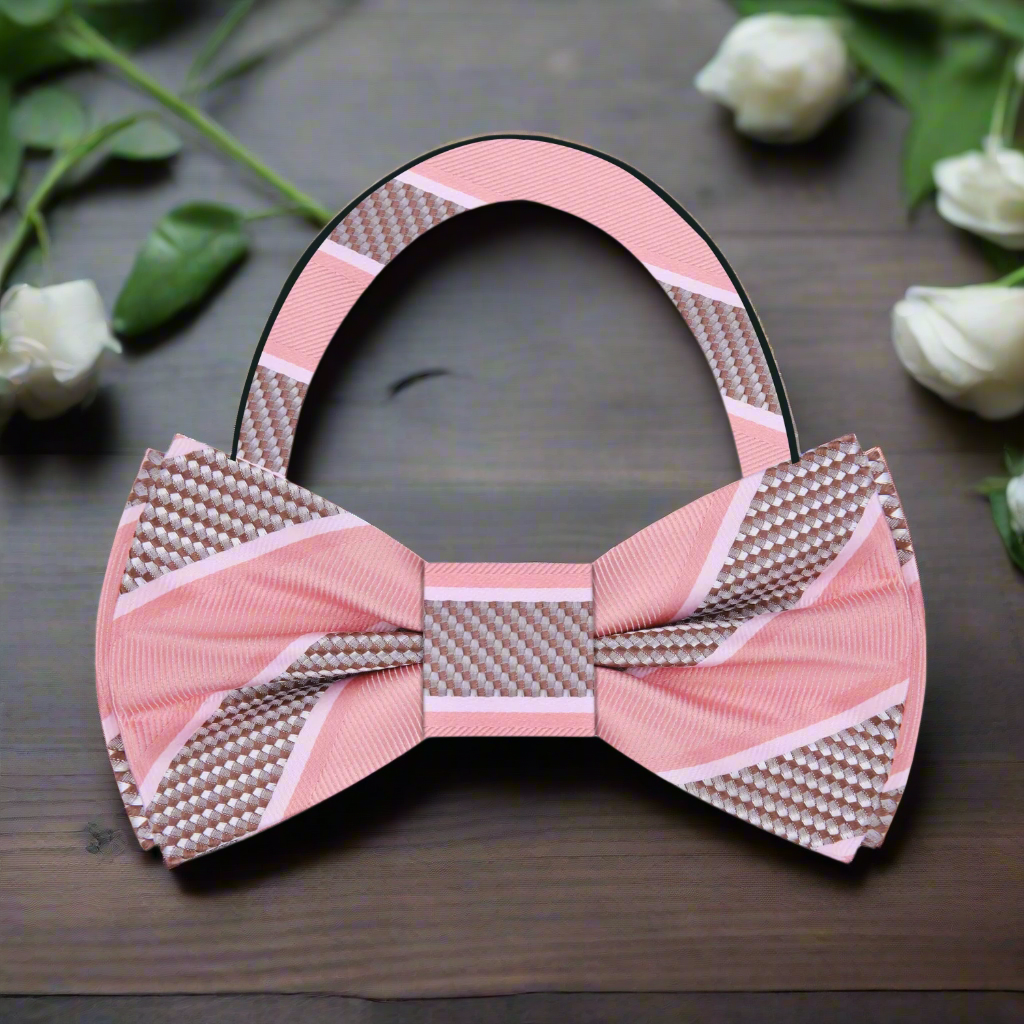 Model wearing a silk striped bow tie with a navy suit for a formal event