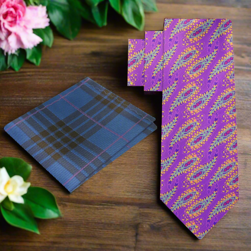 Man wearing colorful paisley necktie with navy suit at garden party