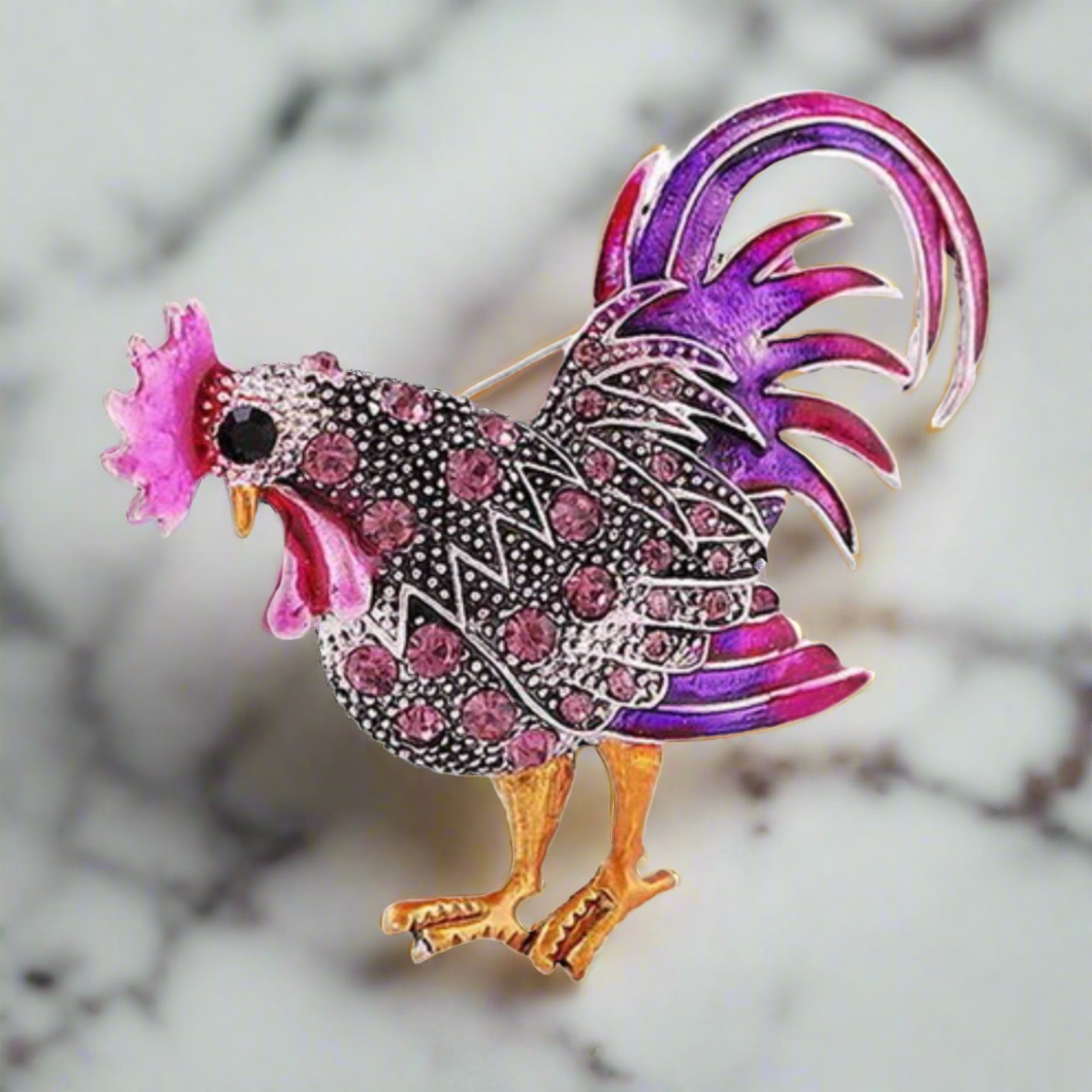 Close-up of a gemstone exotic animal pin with vibrant colors, ideal for fashion accessories and gifts