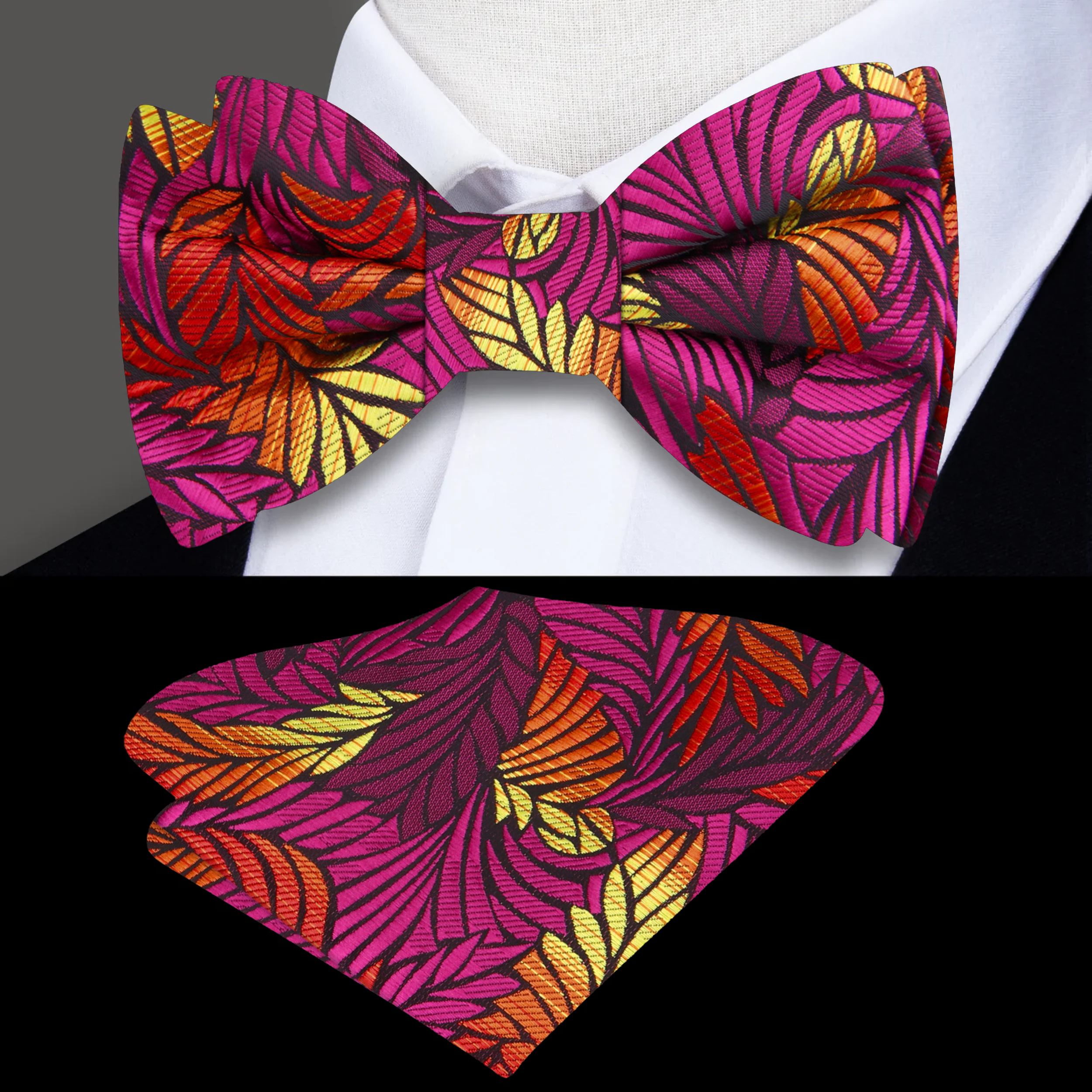 Model wearing a vibrant abstract feather silk bow tie paired with a navy suit at a wedding.
